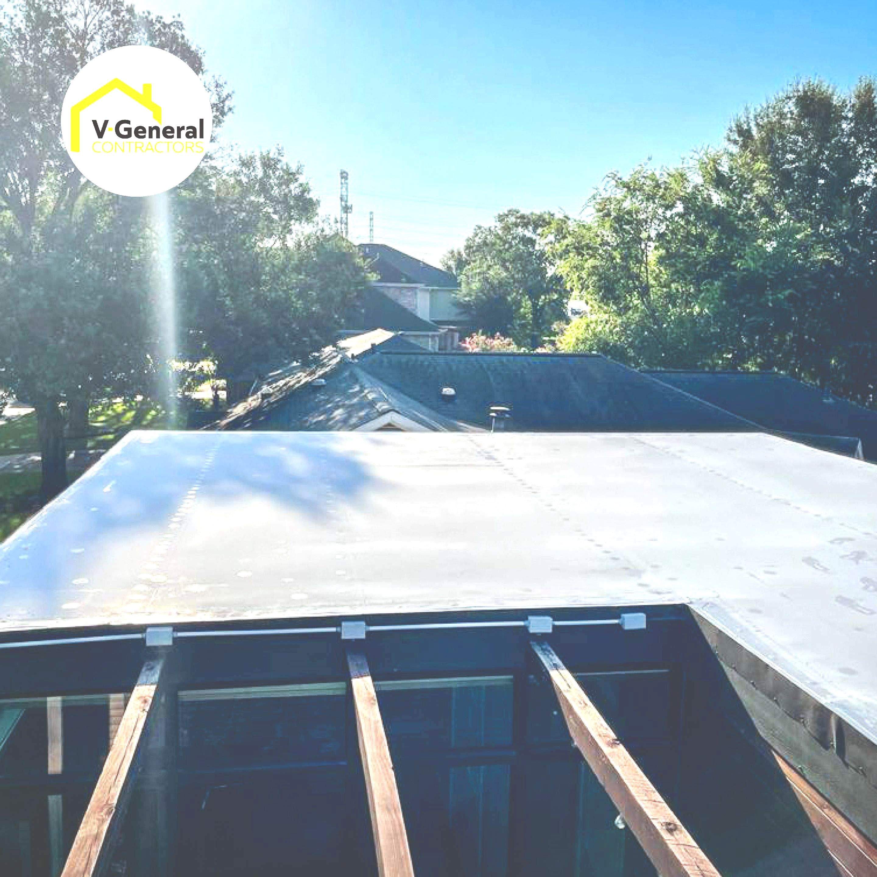 Flat Roof Using Asphalt Coat by V General Contractors 