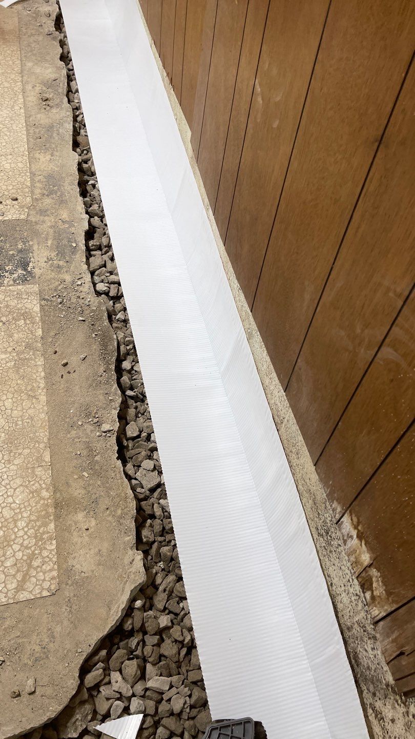Interior Waterproofing Using GrateDrain™ Products by Toledo Basement Repair 