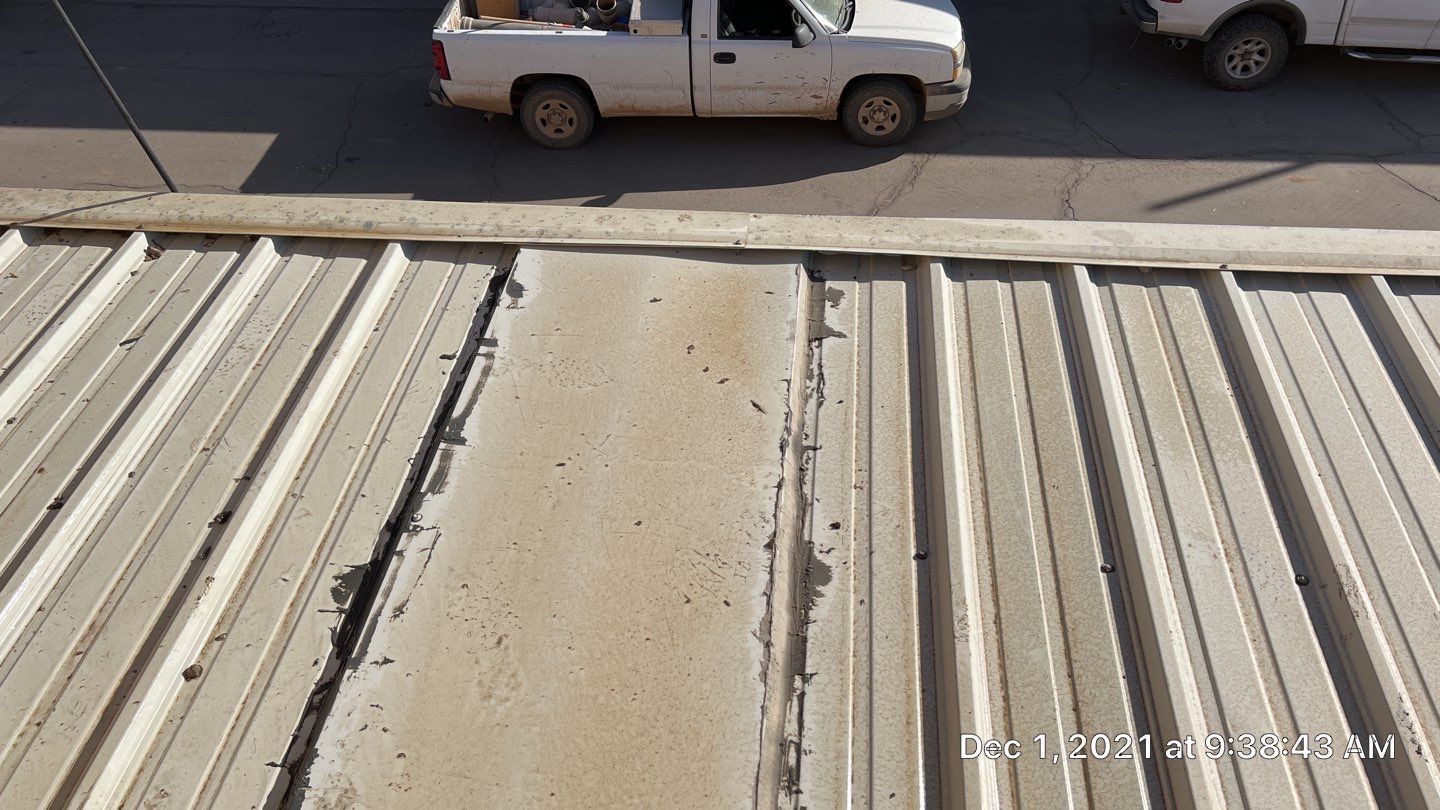 Metal roof restoration on commercial roof using Conklin Benchmark/PUMA XL fabric and coating by Straight Edge Roofing Inc