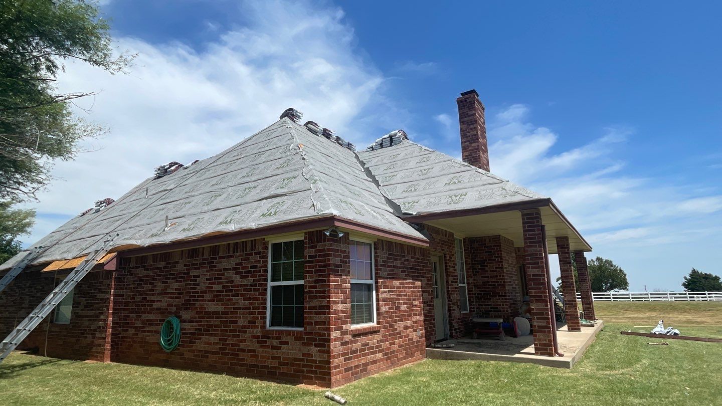 Residential Roofing Installation using GAF Natural Shadow  by A & H Roofing and Contracting