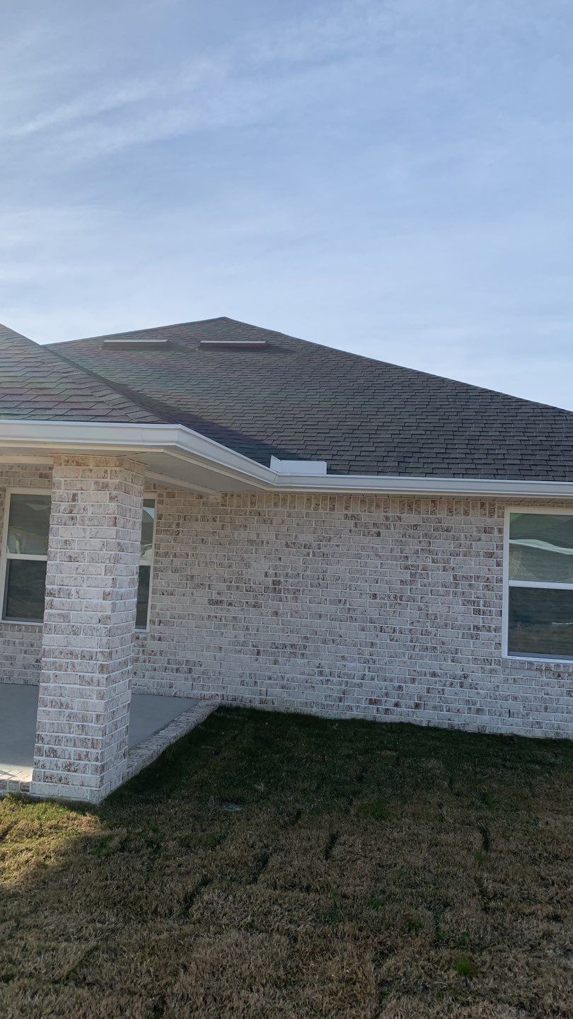 Seamless Gutter Installation Using White K-Style Gutters by Gutter Professors