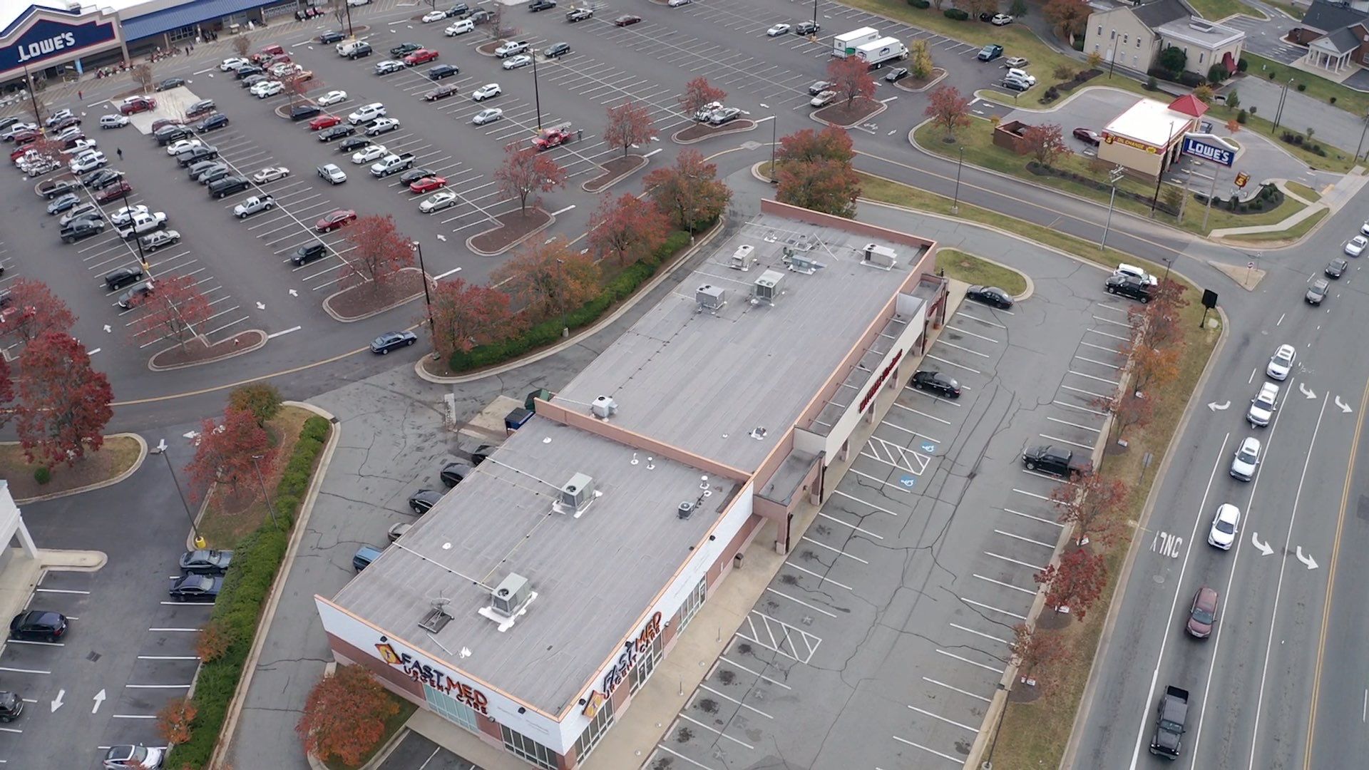 Commercial Coating using Poly Urerthane and Silicone Coating by Just In Time Roofing and Restoration
