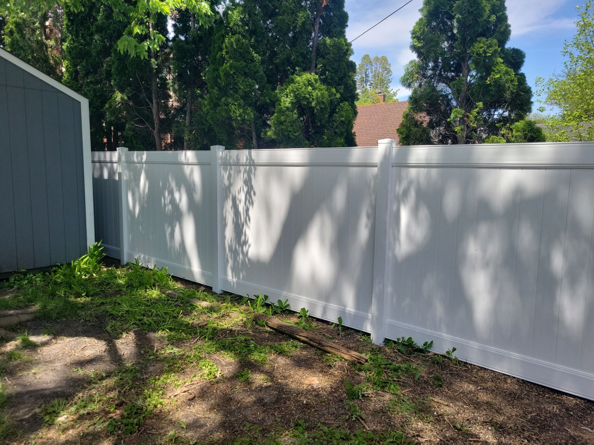 Residential White Vinyl Privacy Fence Installation in Waterloo by Perfect Picket Fence and Stain
