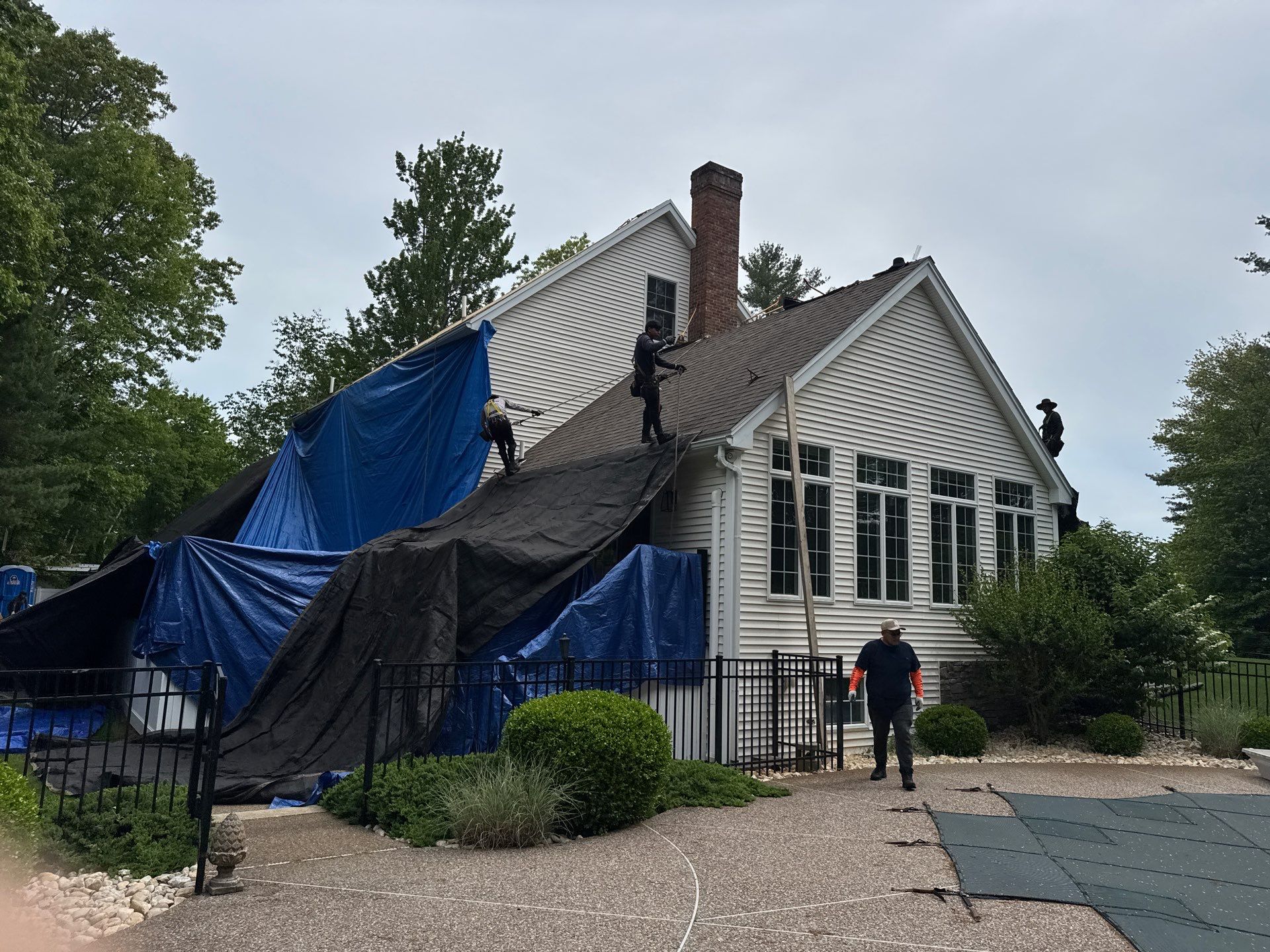 Roof Replacement on Cobbetts Pond in Windham, NH with Owens Corning Onyx Black Shingles by Compass exteriors