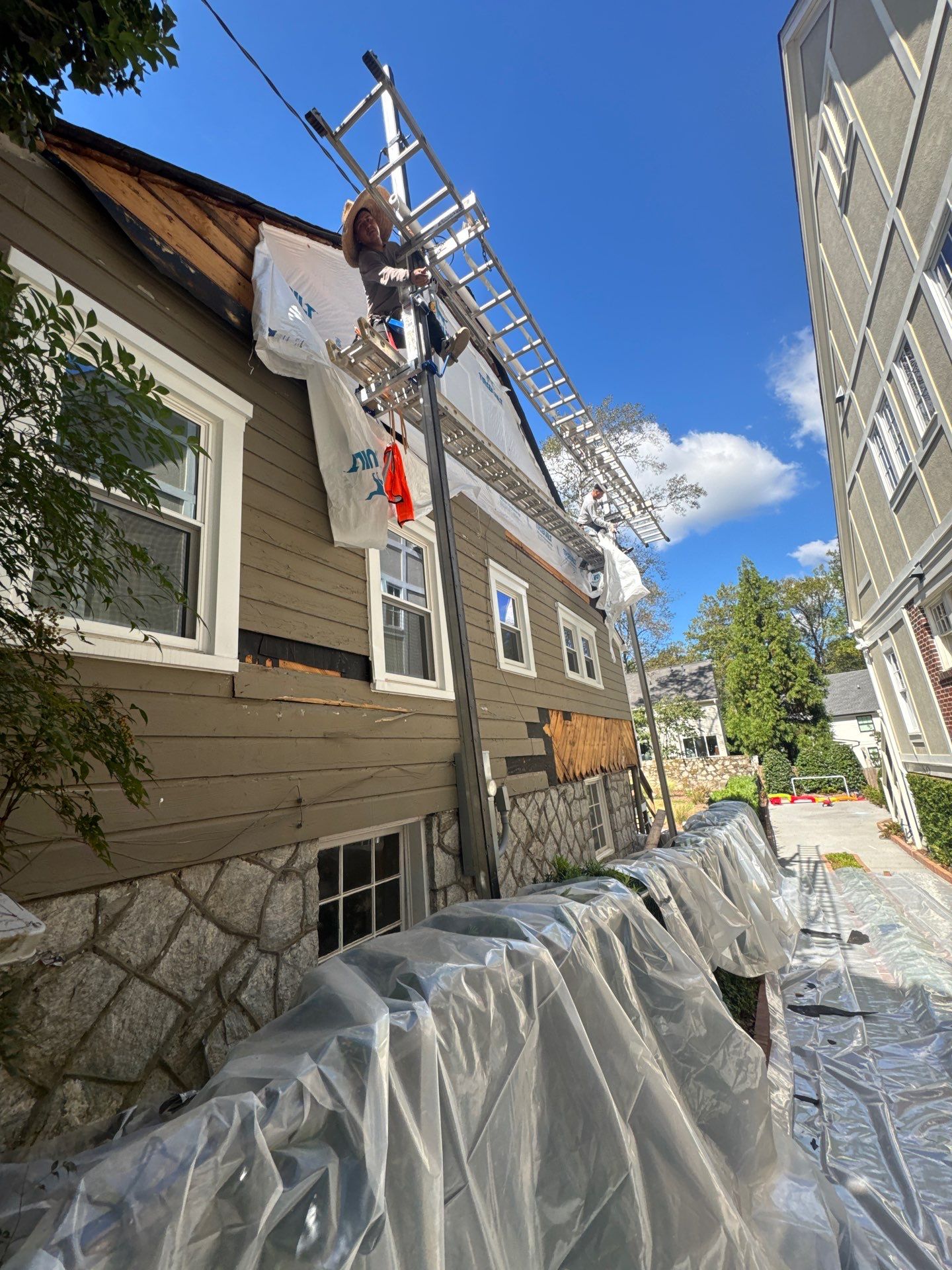 Full Siding Replacement, Deck Build, Exterior Paint, and Gutter Replacement  by Nelson Exteriors 
