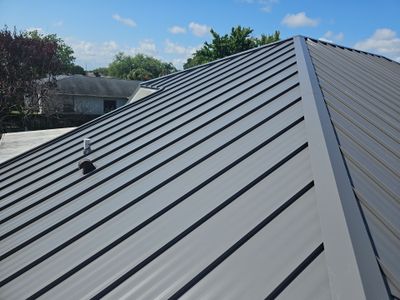 Complete Metal Roof Replacement and Seamless Gutter Installation in Melbourne