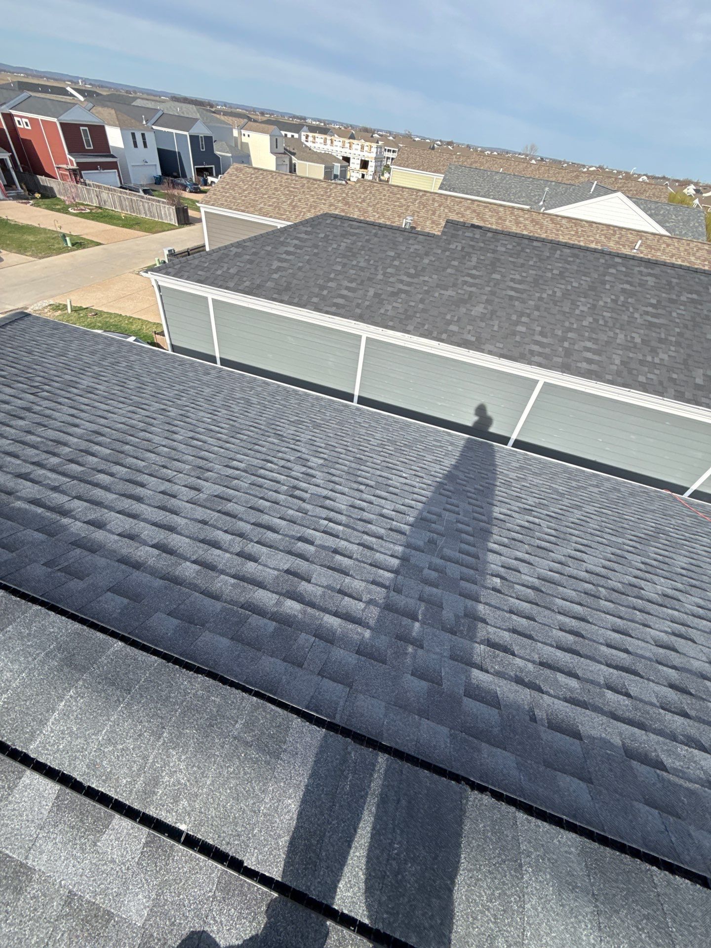 Complete Roof and Siding Replacement for Hail Damage in New Town, St. Charles by Acute Roofing And Exteriors 
