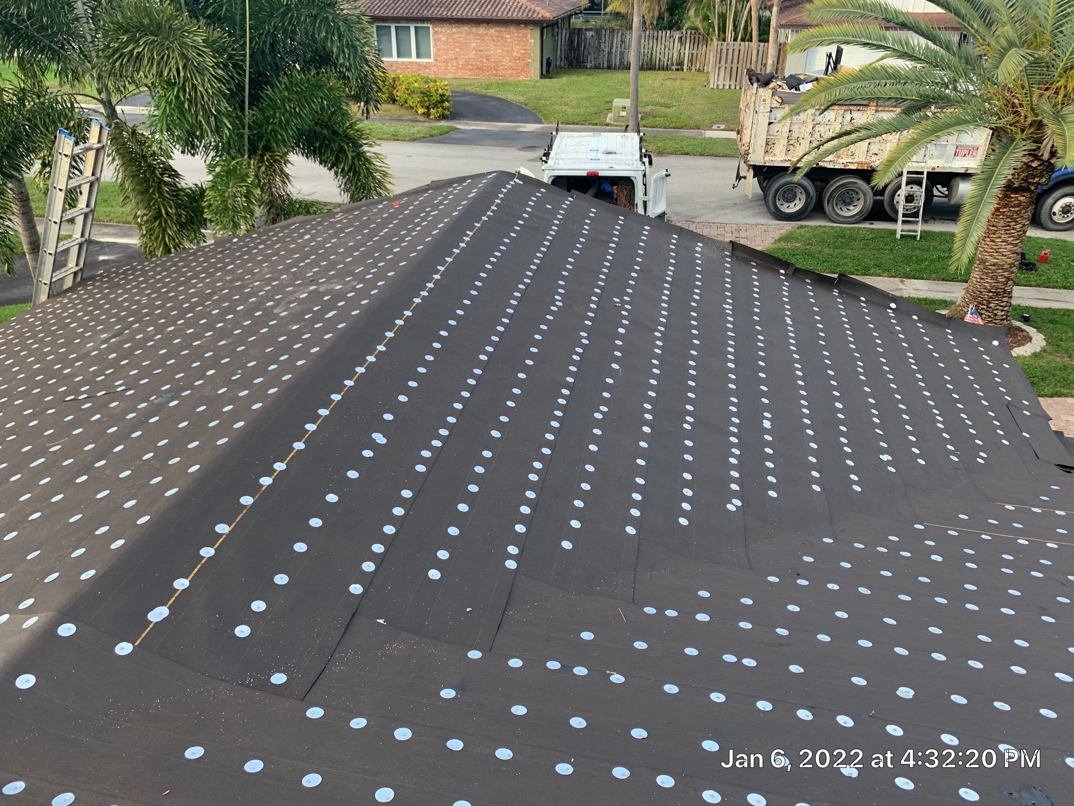 Residential Roofing Installation using 1" Nail strip metal roof by BLUES BROTHERS ROOFING