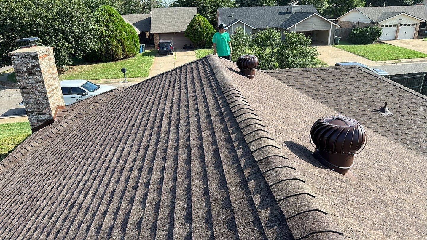 roof, vent, and skylight replacement in Edmond by McCann's Roofing and Construction
