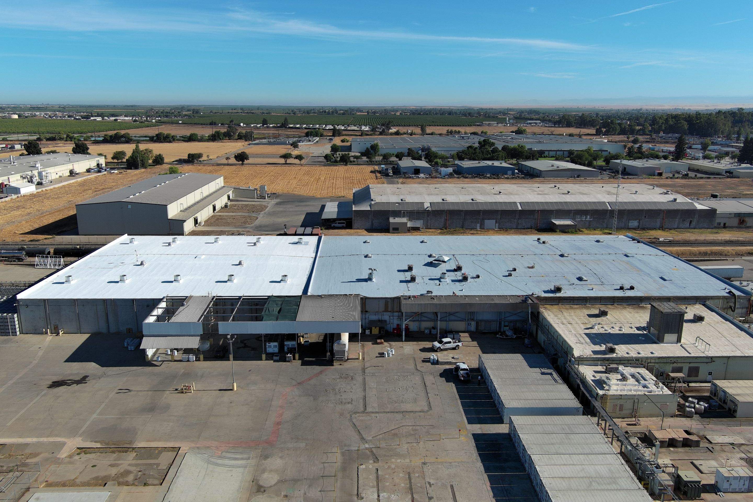 Pro Farms Spray foam roofing project by Straight Edge Roofing Inc