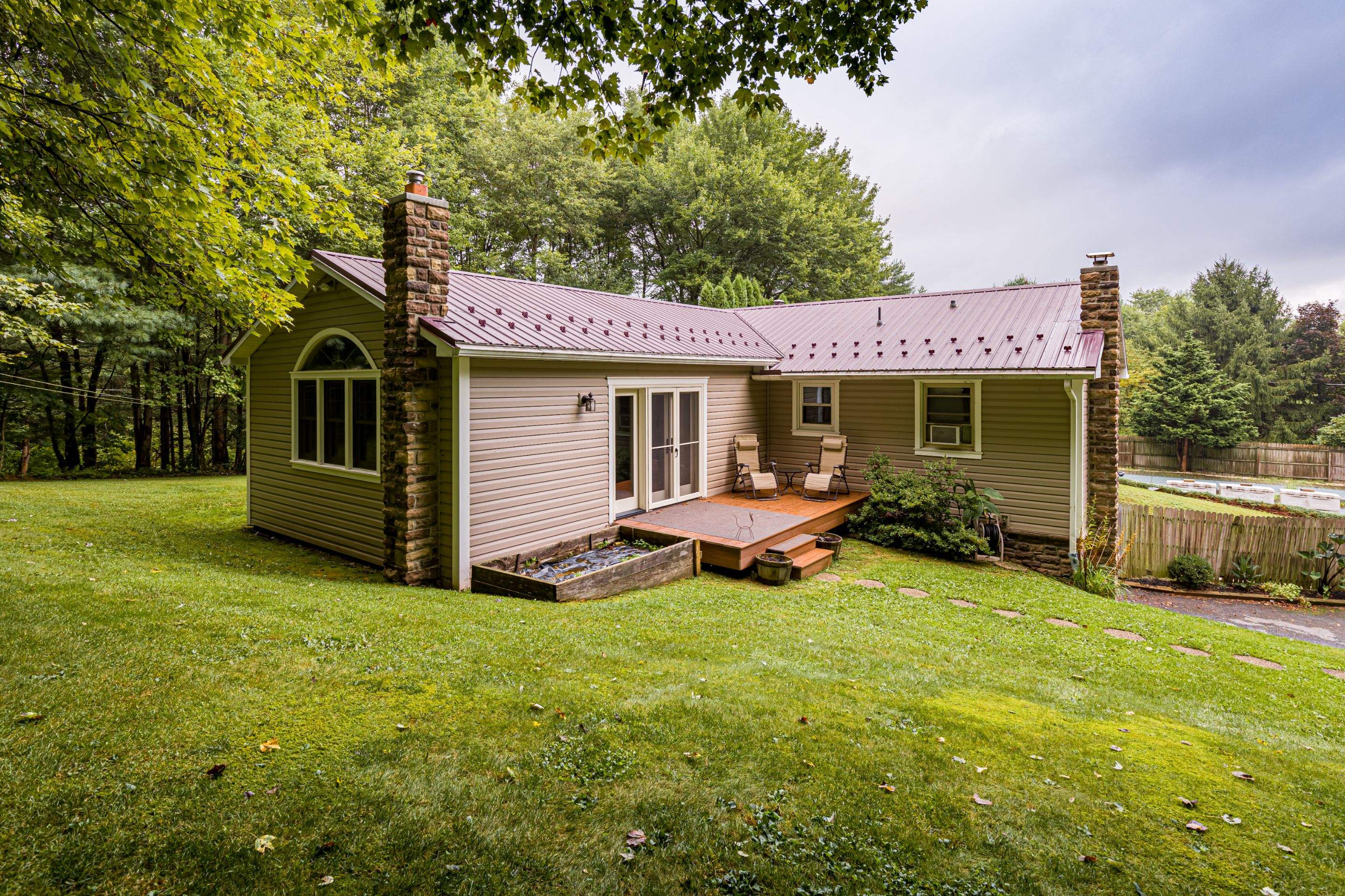 Vinyl Siding- by Esh Builders