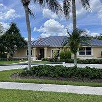24ga 1.5" Snap-Lock Dark Bronze by Total Roofing System The Metal Roof Experts