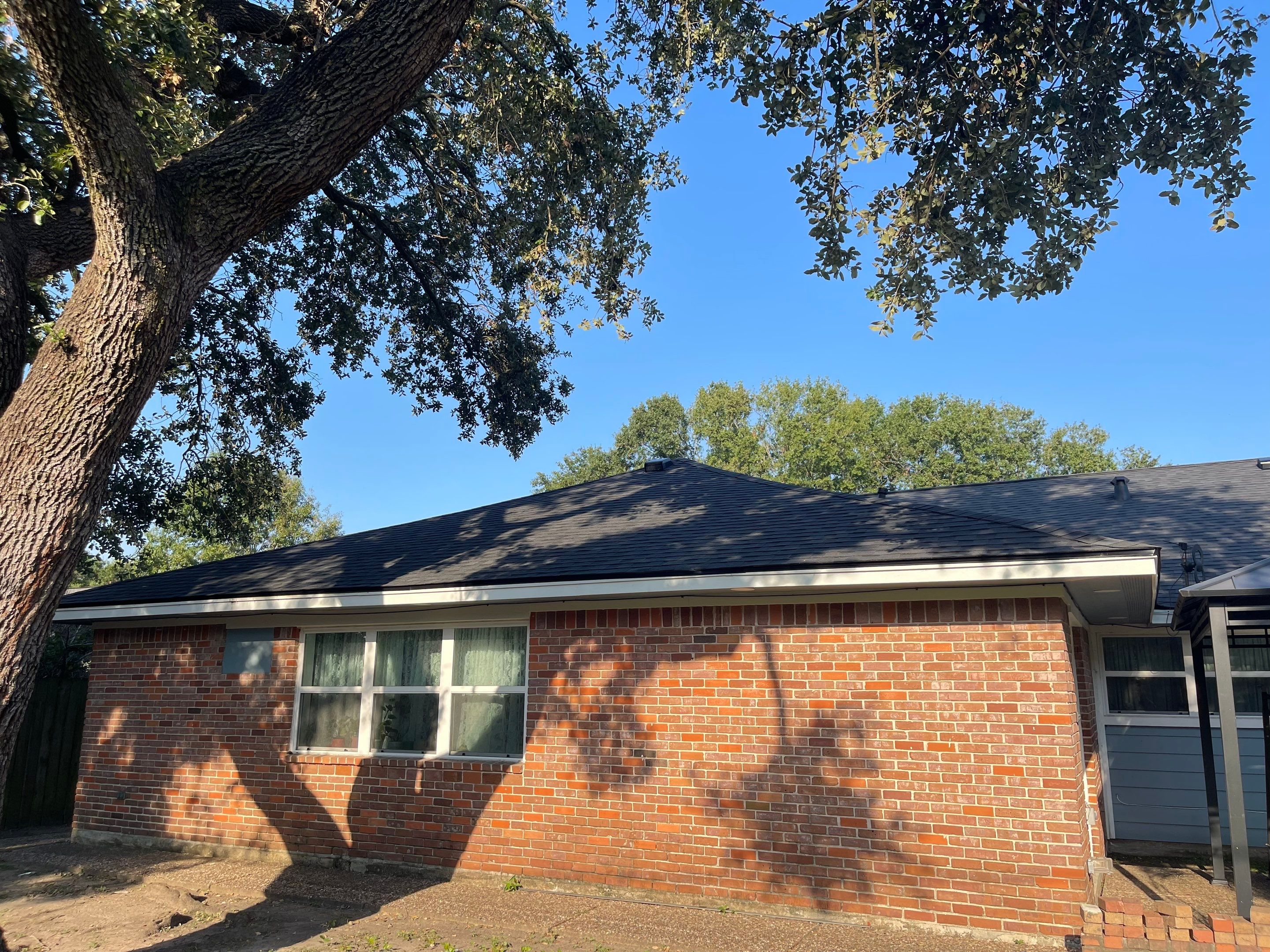 Residential Roofing Installation using Tamko Heritage® Series Rustic Black by CAP Roofing and Construction LLC