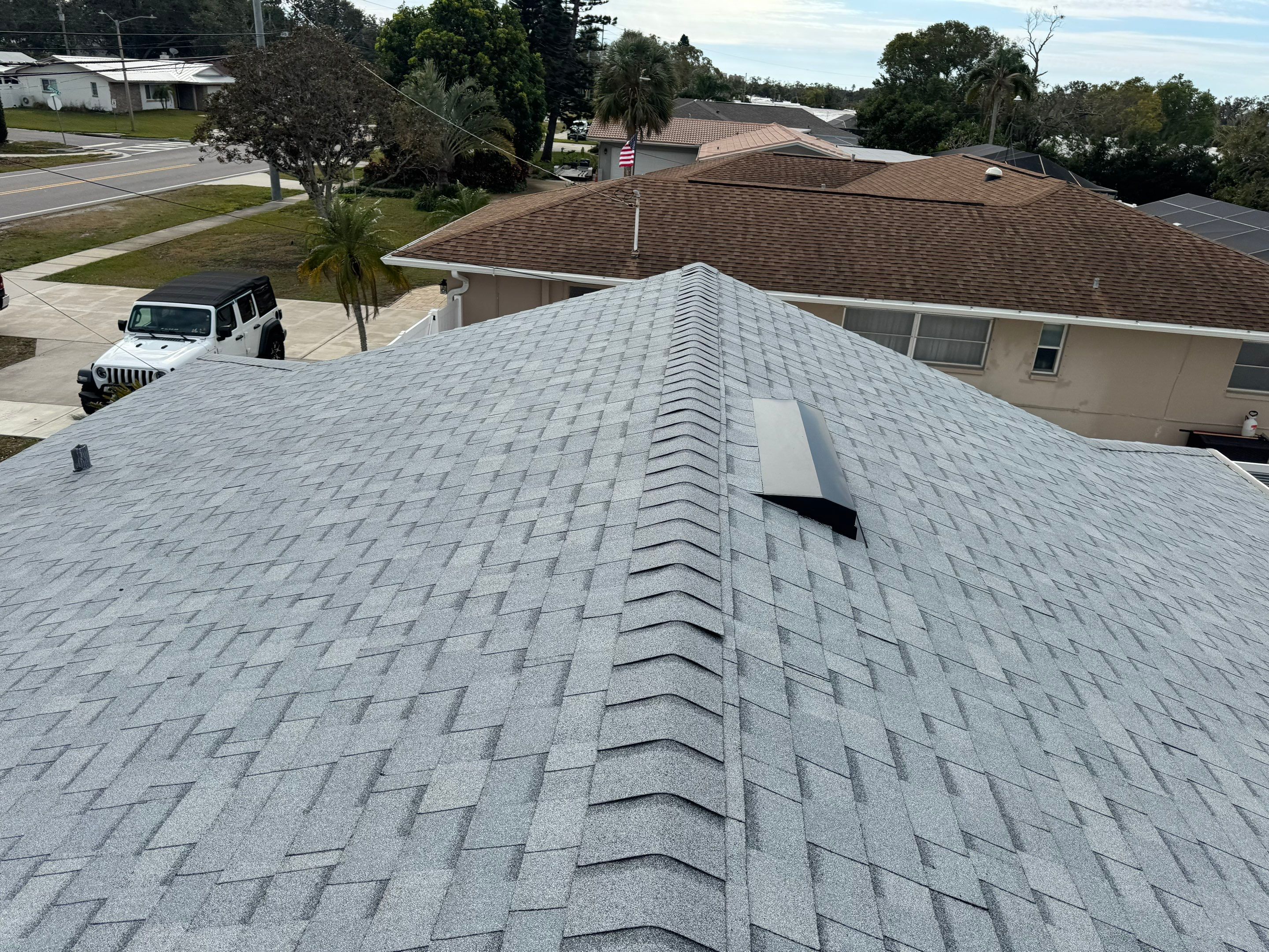 Estate Gray Shingles by Reimagine Roofing