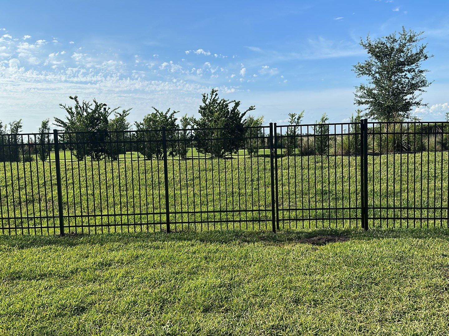 Aluminum Fence Installation using Black 3 Rail Aluminum Fence by Asap fence and gates, LLC