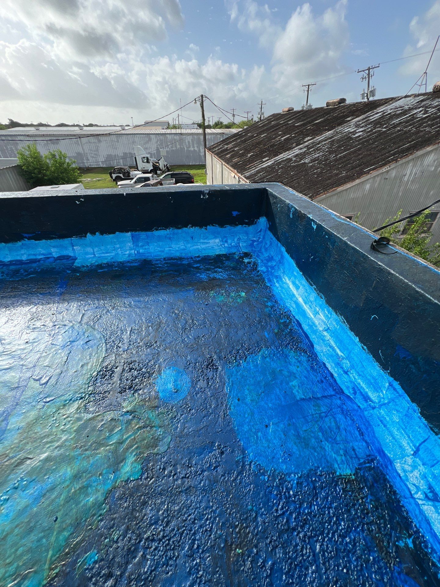 Dirty leaking Gravel Roof by Bayfront Roofing and Construction