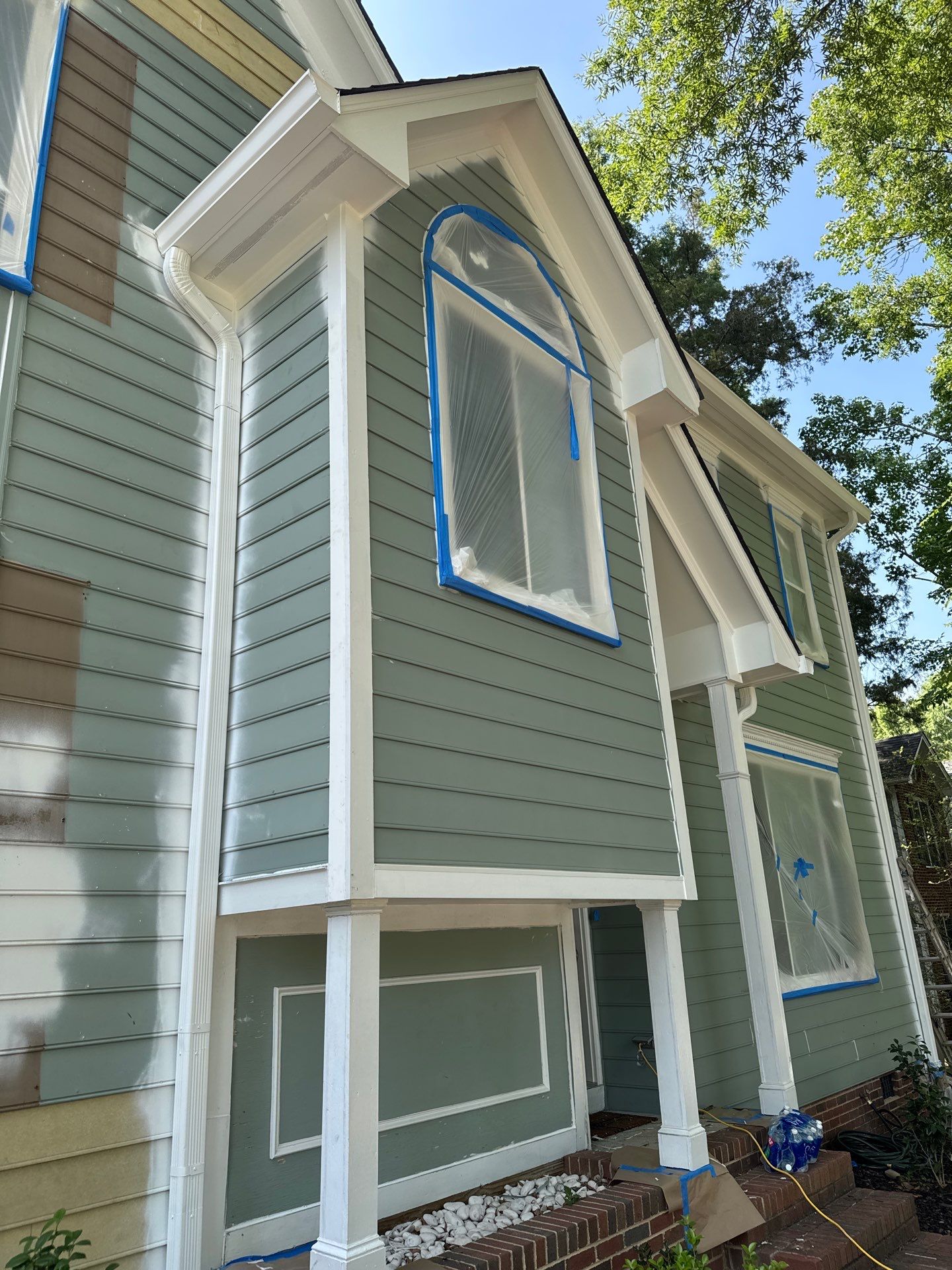 Siding Replacement and painting by GonzalezPainters & Contractors Inc 