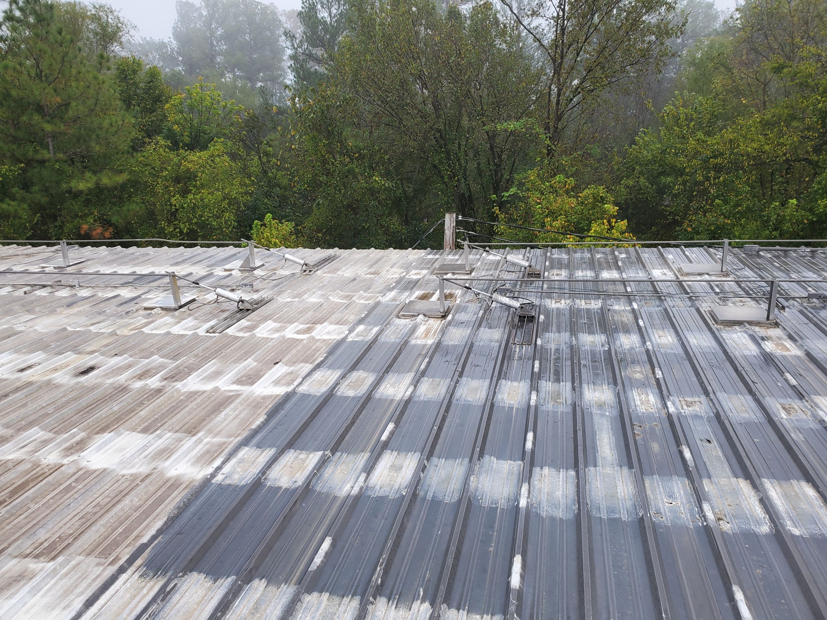 Commercial Roofing Installation using Aluminum Roofing panels by Hostetler Roofing