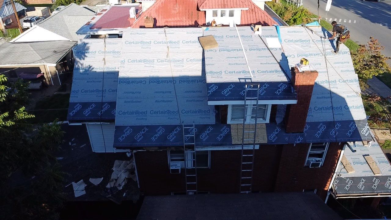 Adkins Project  by Fahey Roofing + Contracting