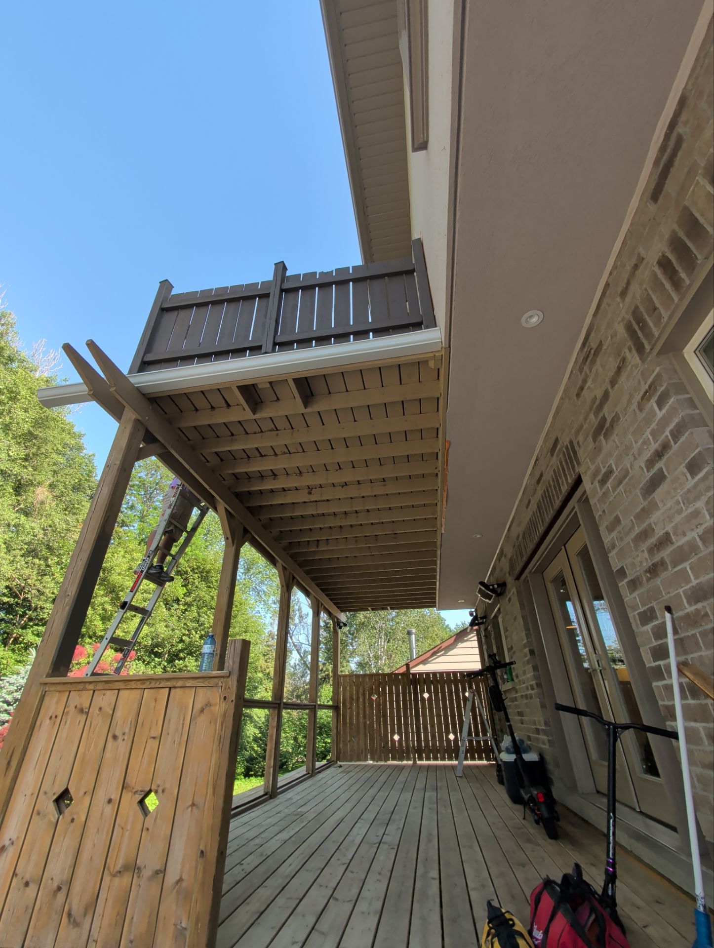 Multi-Level Deck Restoration and Glass Railing Installation in King by GTA HOME PAINTING