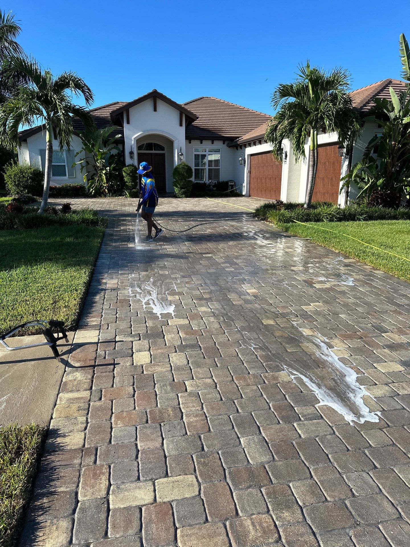 Paver Driveway, Sidewalk, and Pool Deck Cleaning in Winding River Community, Bradenton, FL by Sunshine AquaWash