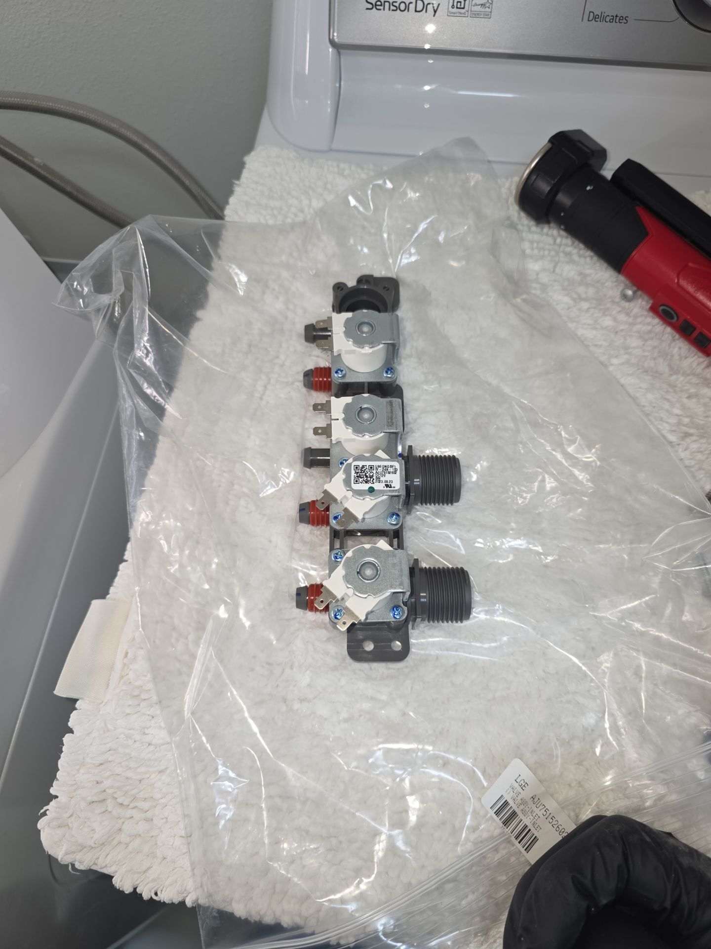 LG Washing Machine Water Inlet Valve Replacement in Windermere by AMB-WORKS APPLIANCE REPAIR