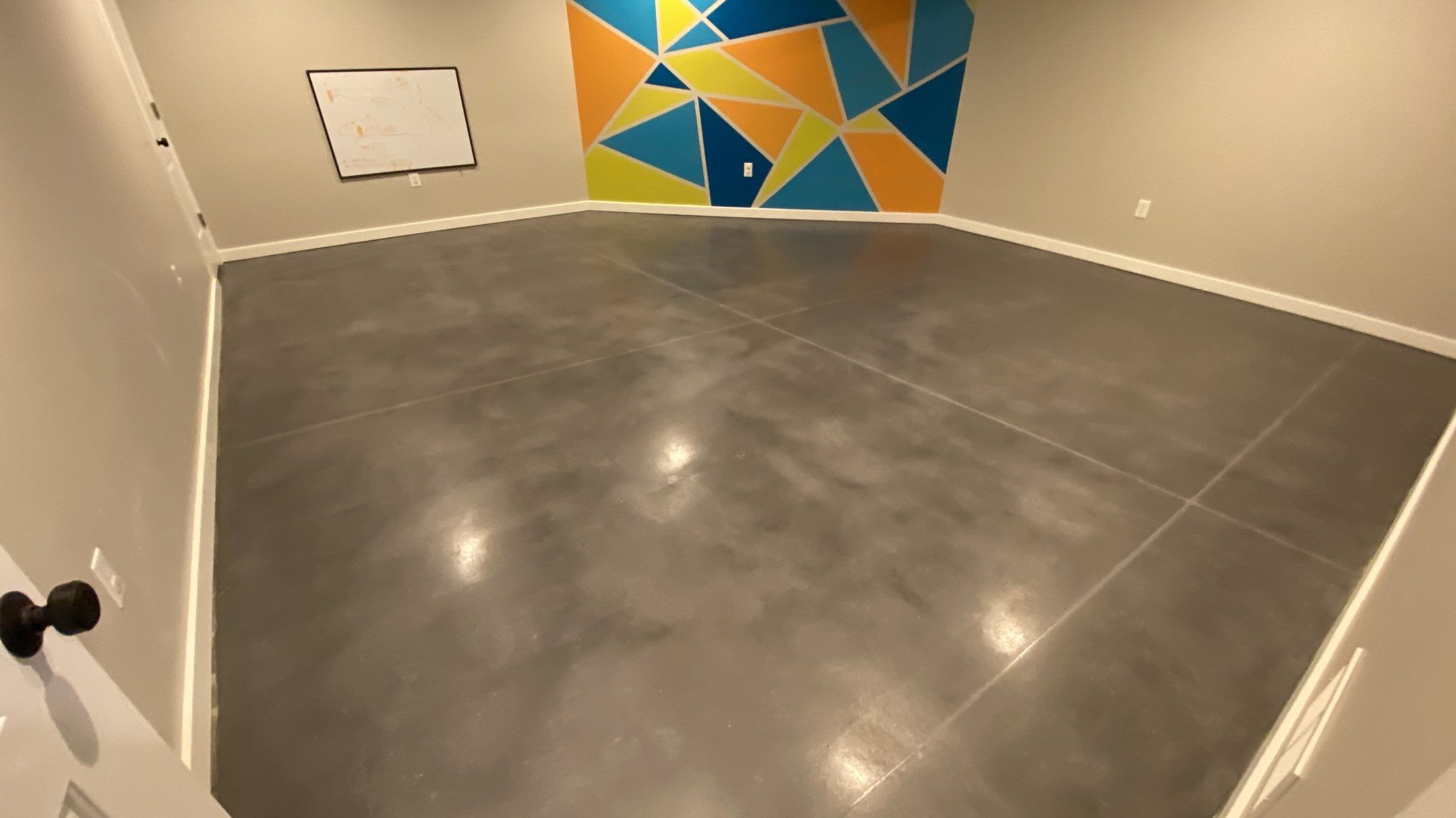 Louisburg, KS -- Basement Polish using Grey Stain by Big Red Decorative Concrete, LLC