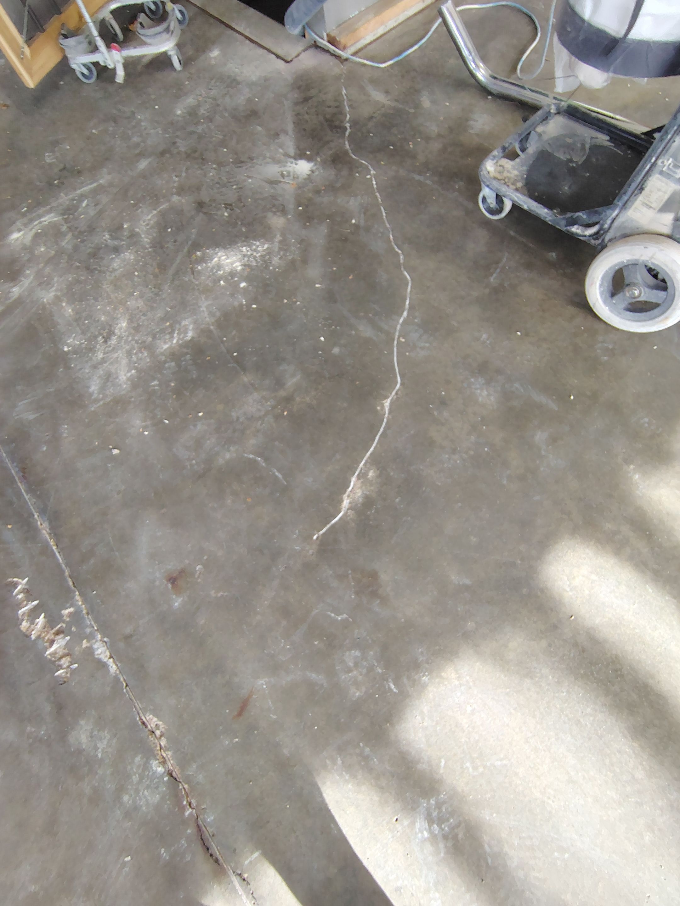 Garage Floor Concrete Coating and Crack Repair in Sioux Falls by Select Painting, Coatings & Garage Cabinets
