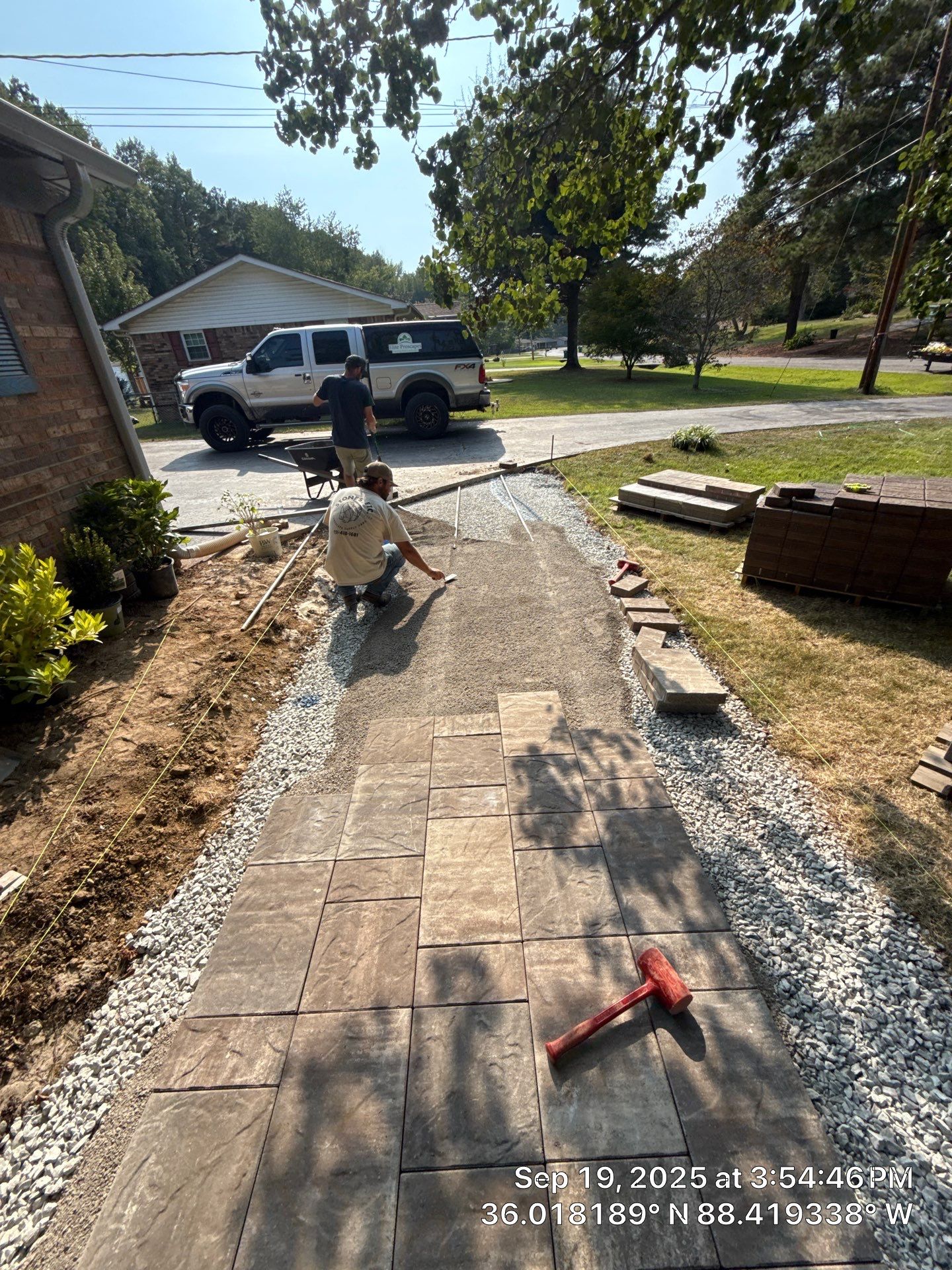 Front Entry Enhancements and a Back Deck Upgrade by Elite Proscapes LLC