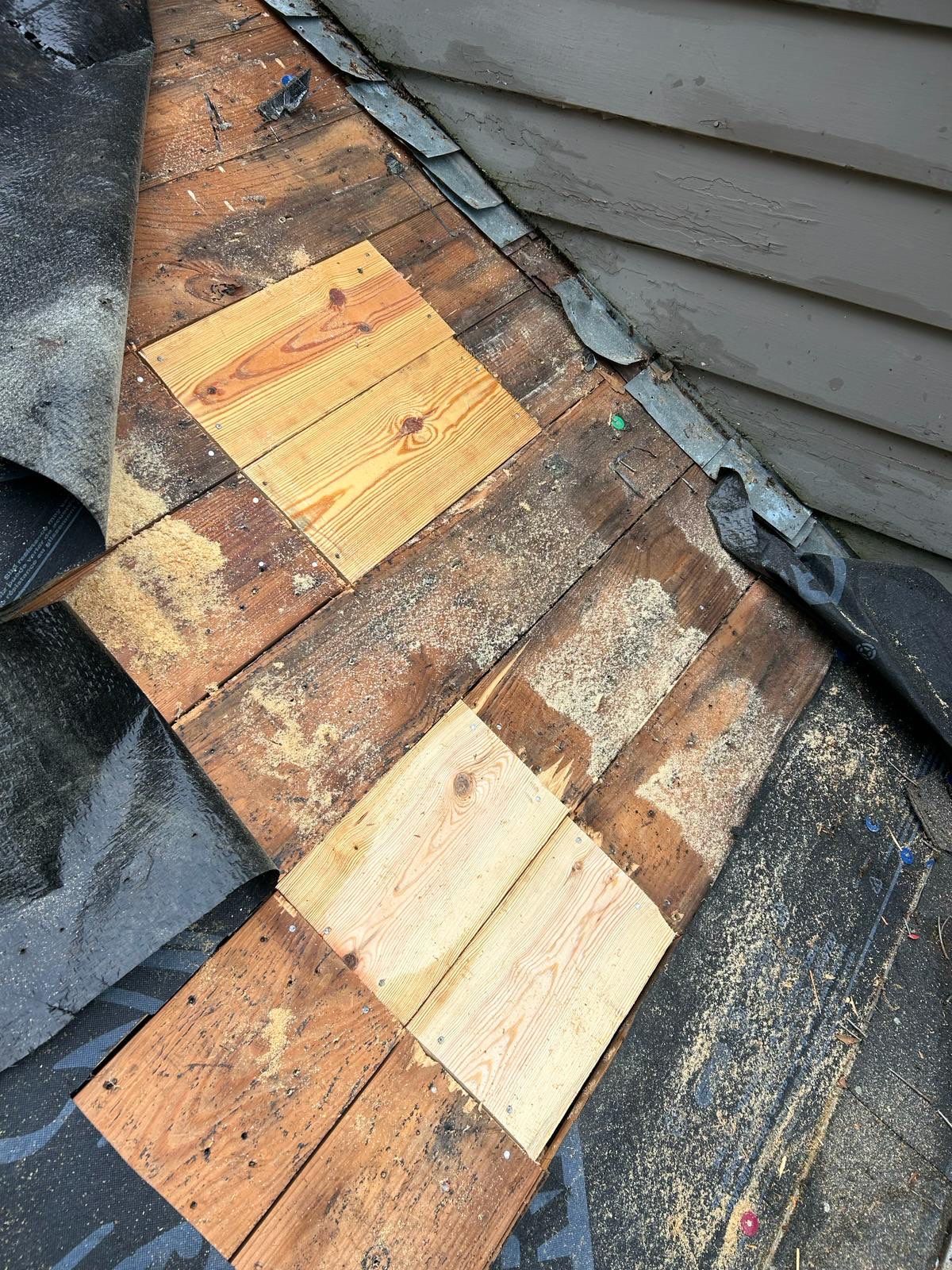 Residential Roof Repair and Decking Replacement After Tree Damage by Revival Roofing Services