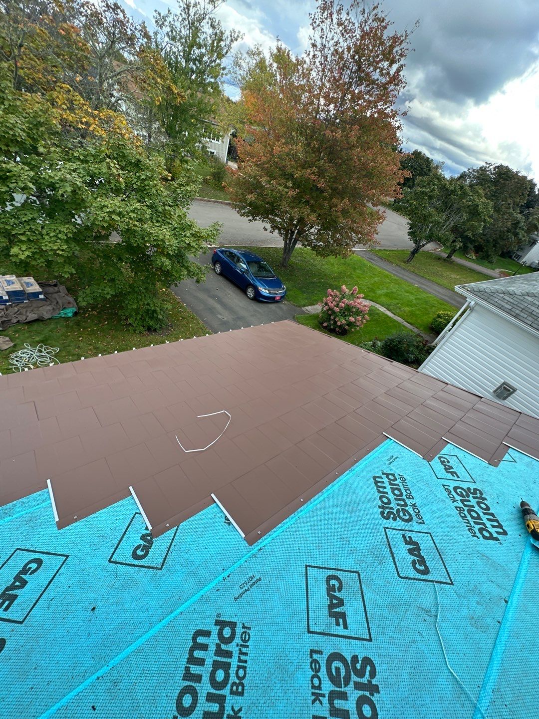 Residential Roofing Installation using Wakefield Bridge Steel Shingle by Ideal Steel by Artisan Roofing & Home Improvements Inc.