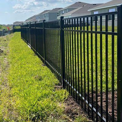 Aluminum Fence Installation using Black 3 Rail Aluminum Fence
