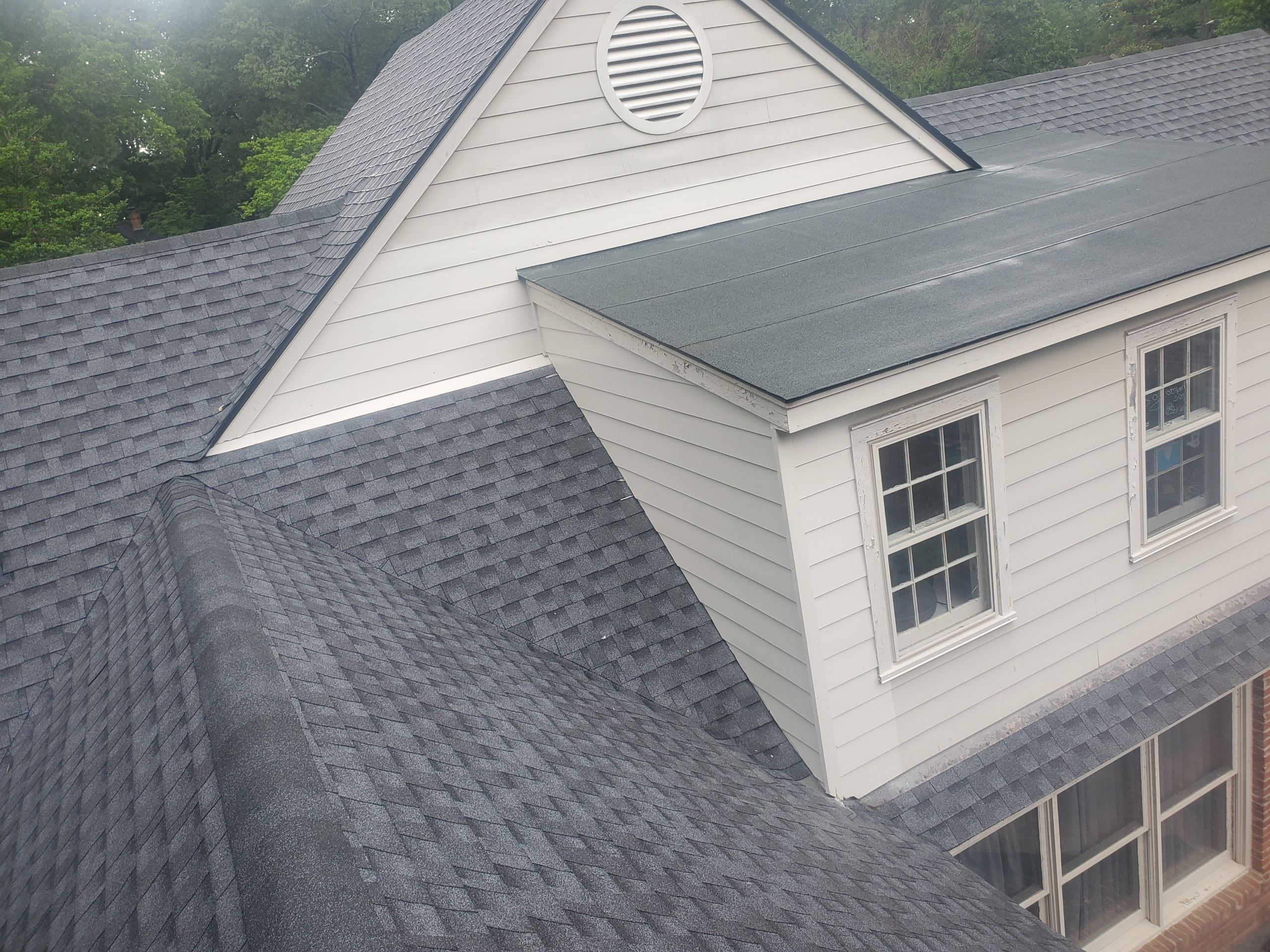 Full Roof Replacement with gutter upgrade after tree impact damage in East Memphis by Revival Roofing Services