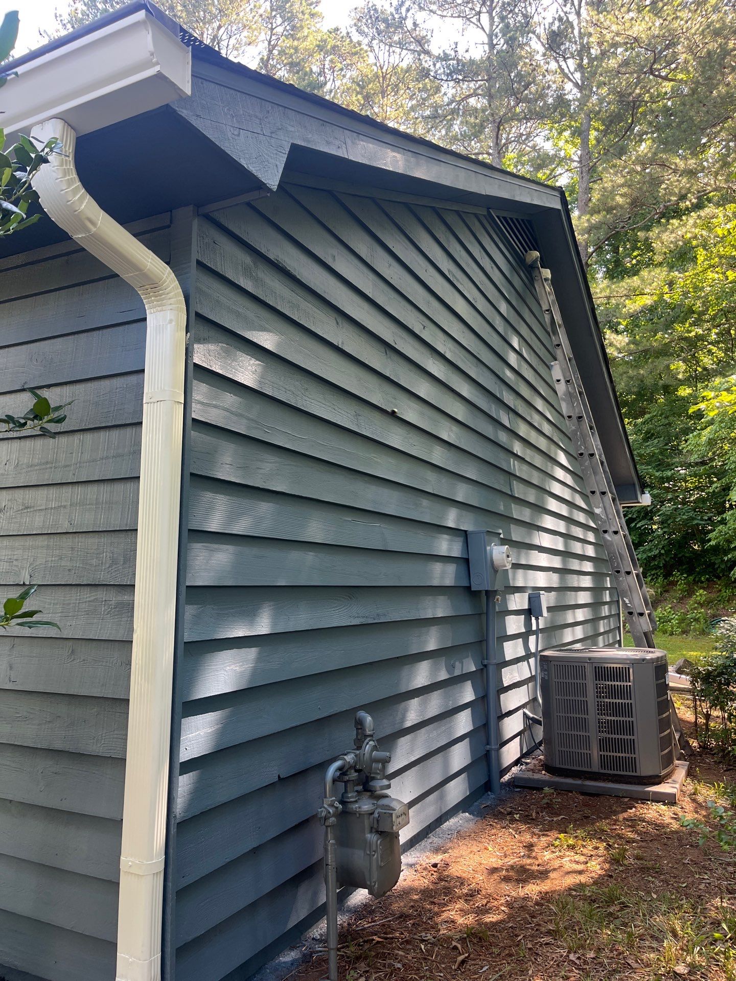 Marietta, GA Exterior Painting Transformation with Blue Paint by Nelson Exteriors