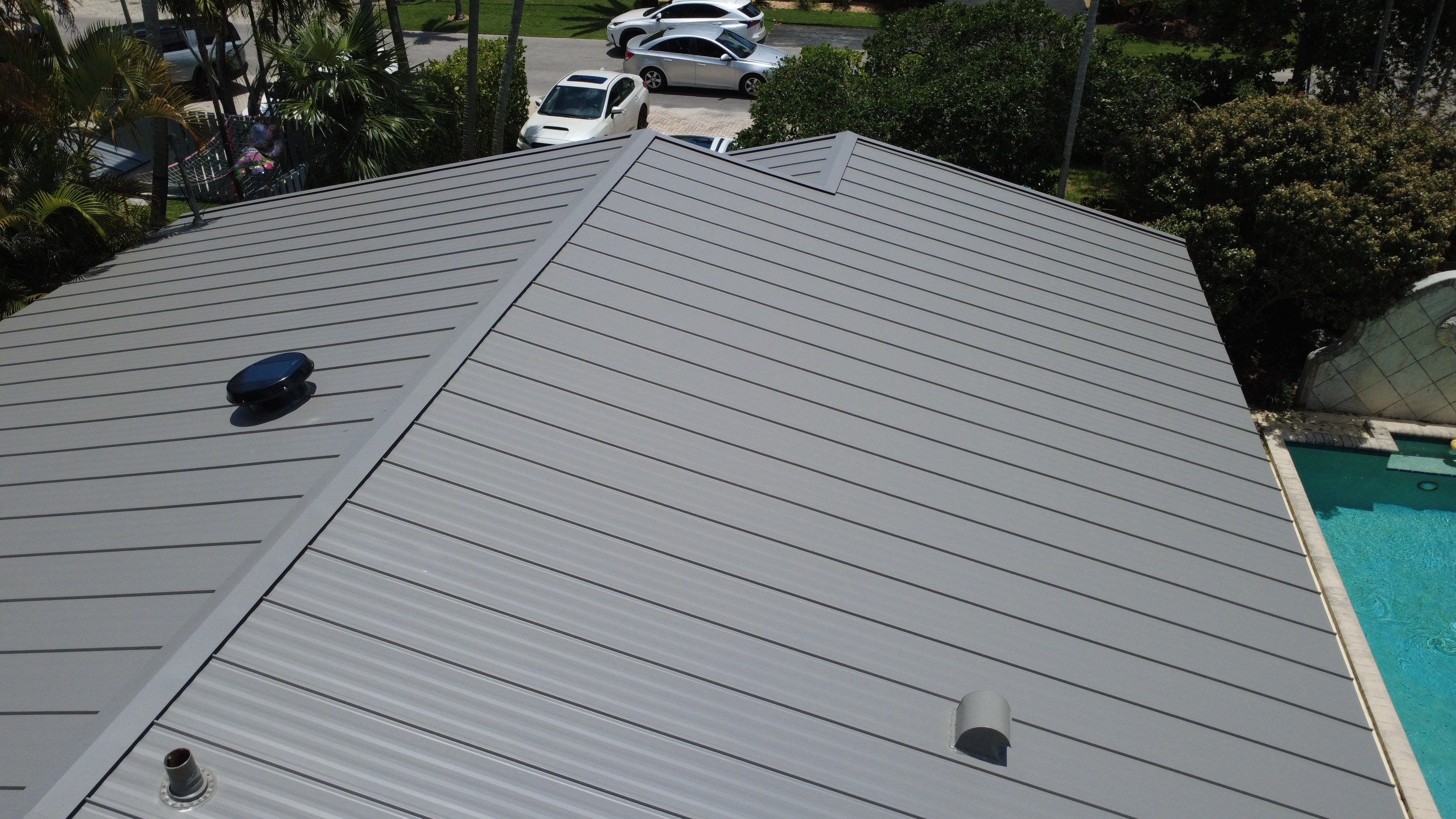 Residential Roofing Installation using 1" Nail strip metal roof by BLUES BROTHERS ROOFING