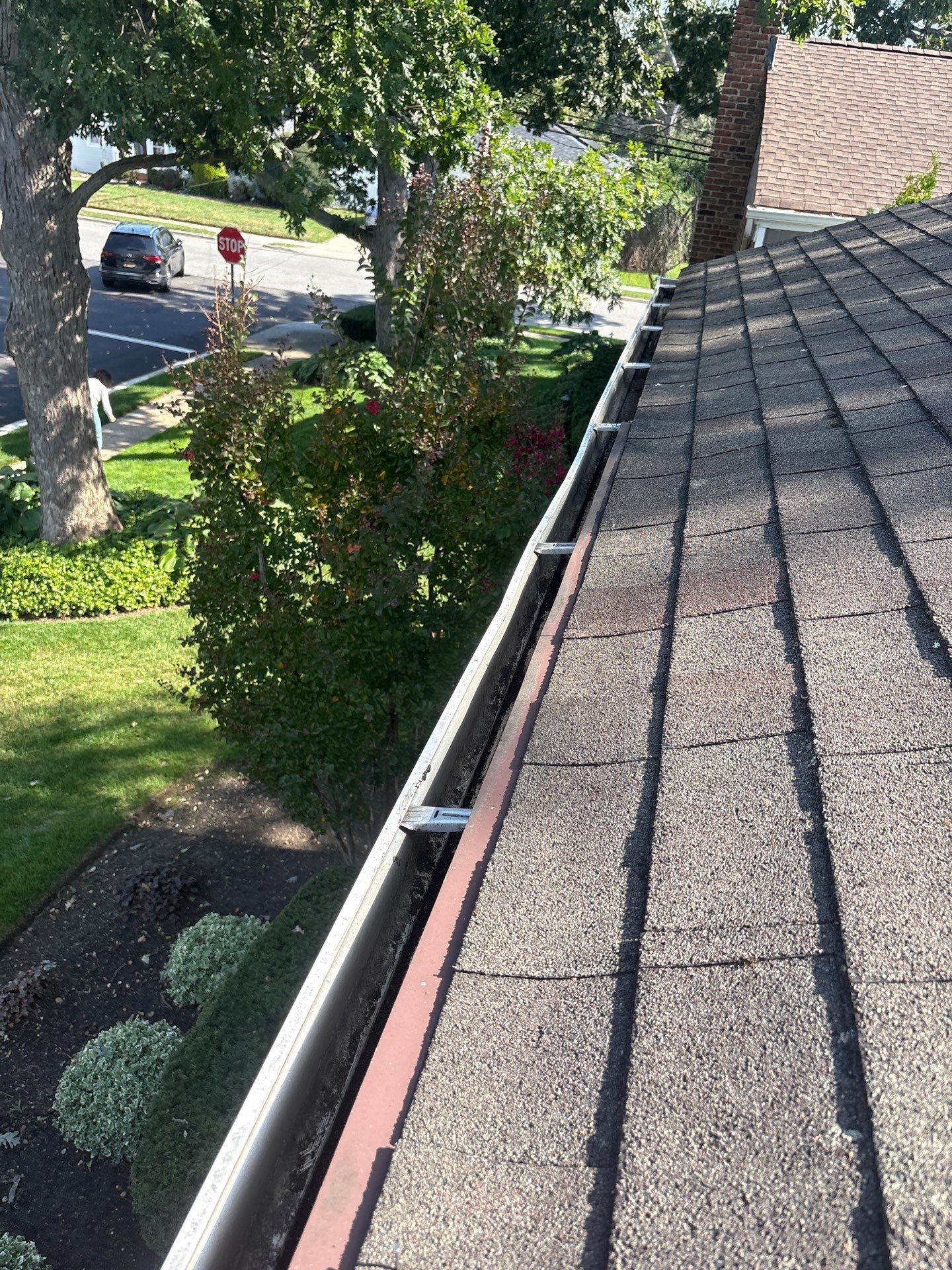 Gutter Cleaning & Debris Removal in Bellmore, NY by Above All Gutters