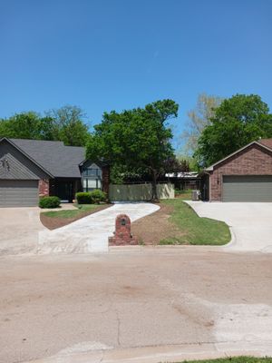 Concrete Driveway and Fence