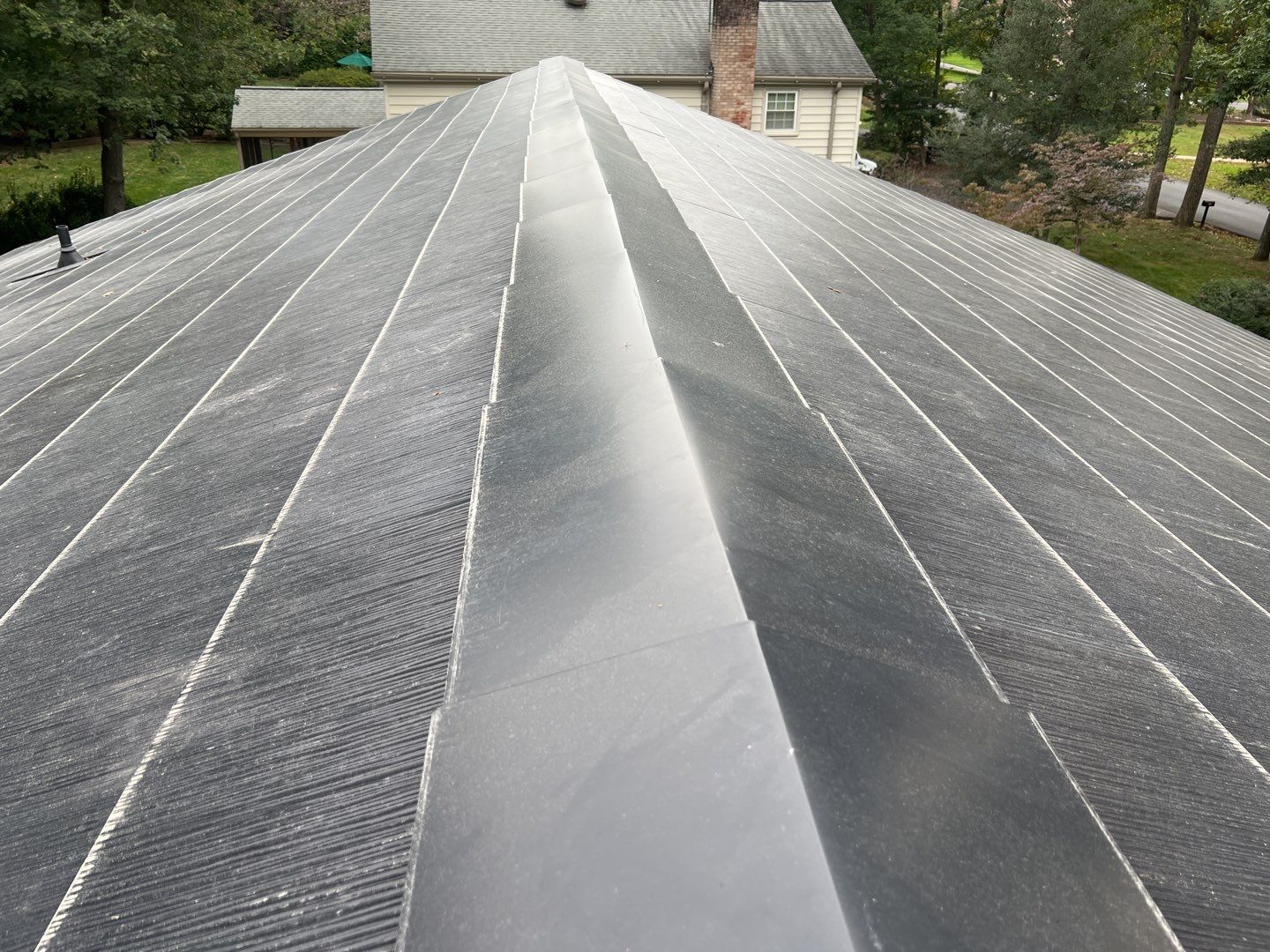 Tesla Solar Roof Replacement using Tesla Solar Roof V3 Tiles by American Home Contractors