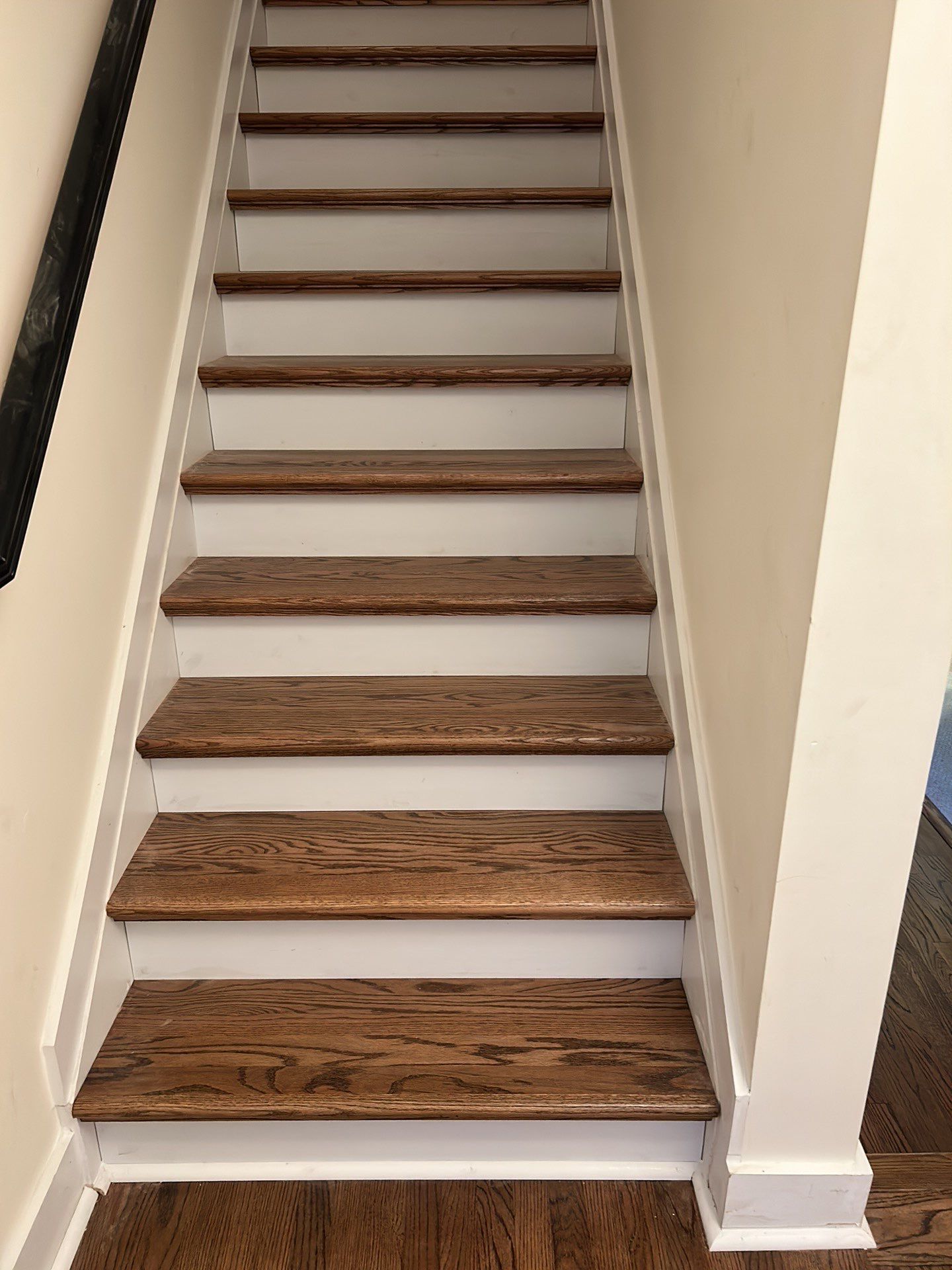 Classic Stair remodel with Oak Treads by Footprints Floors of East Atlanta