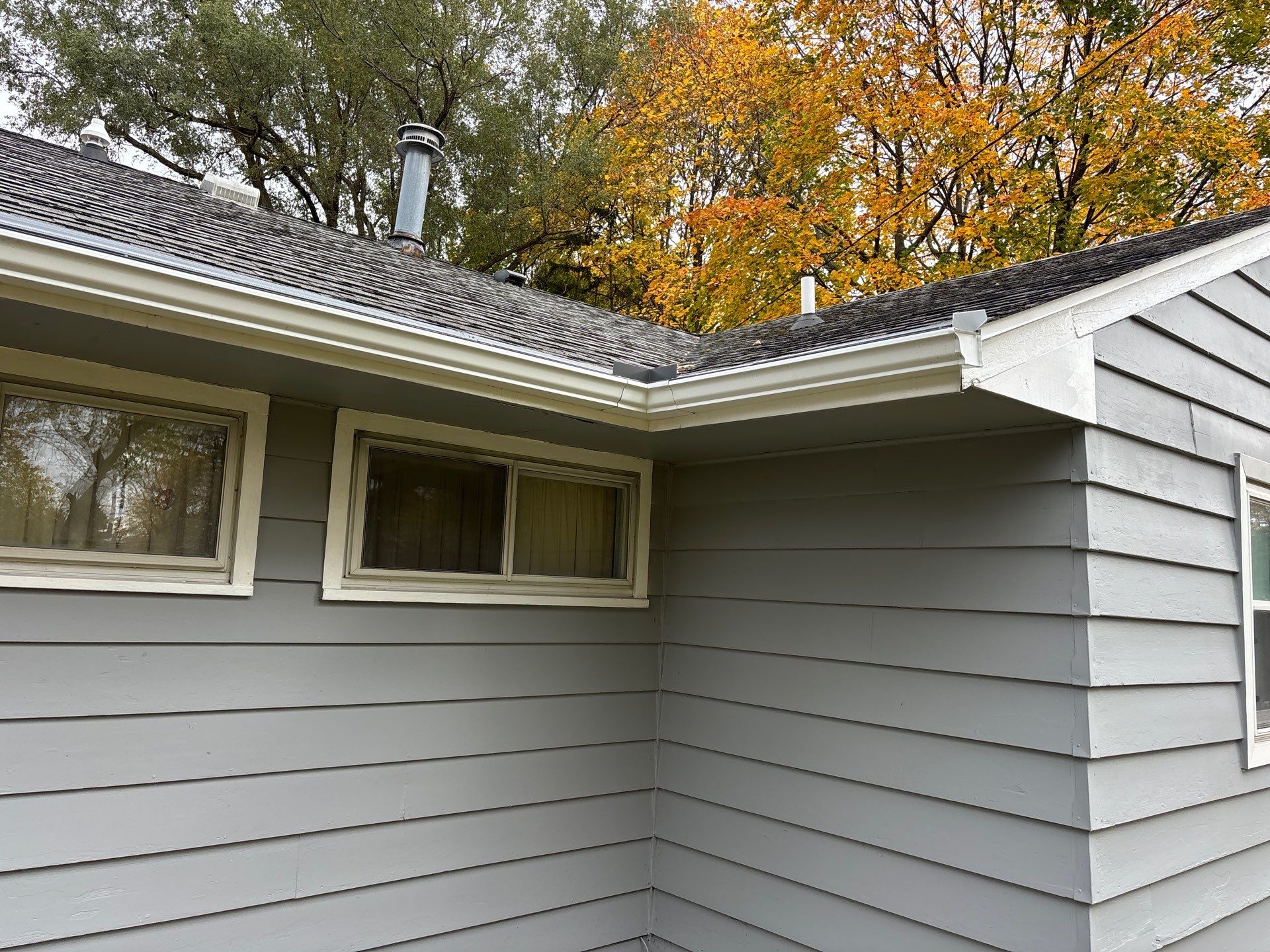Gutter Installation using Seamless Gutters- Aluminum with Gutter Protection by Acme Exteriors