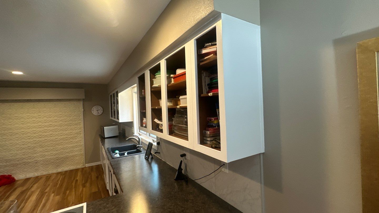 Kitchen Cabinet repaint by Cutting edge painting 