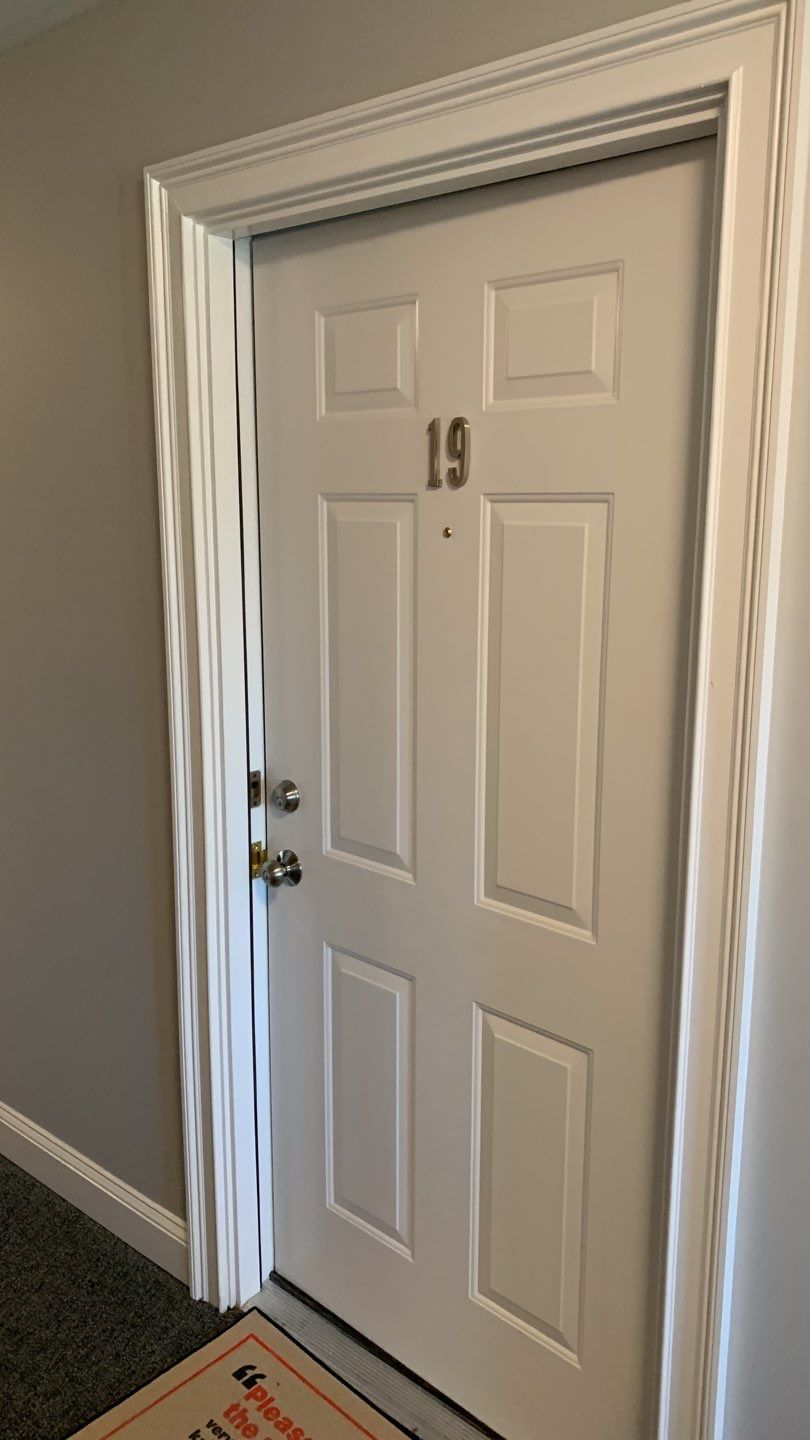 Commercial Roofing Installation using EPDM with white gutters by A Plus Exterior