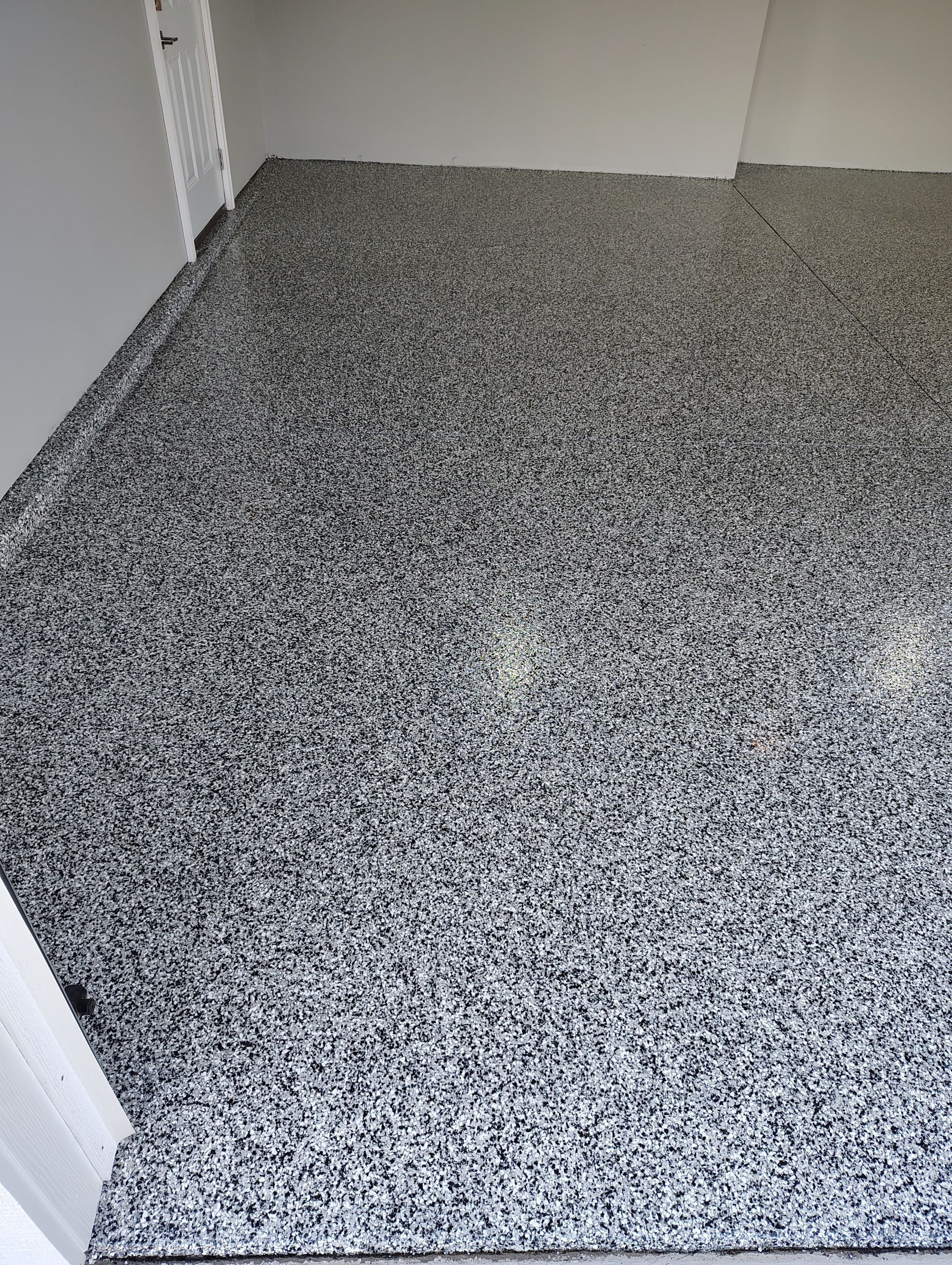 Sioux Falls Garage Floor with Domino Flake by Select Painting, Coatings & Garage Cabinets