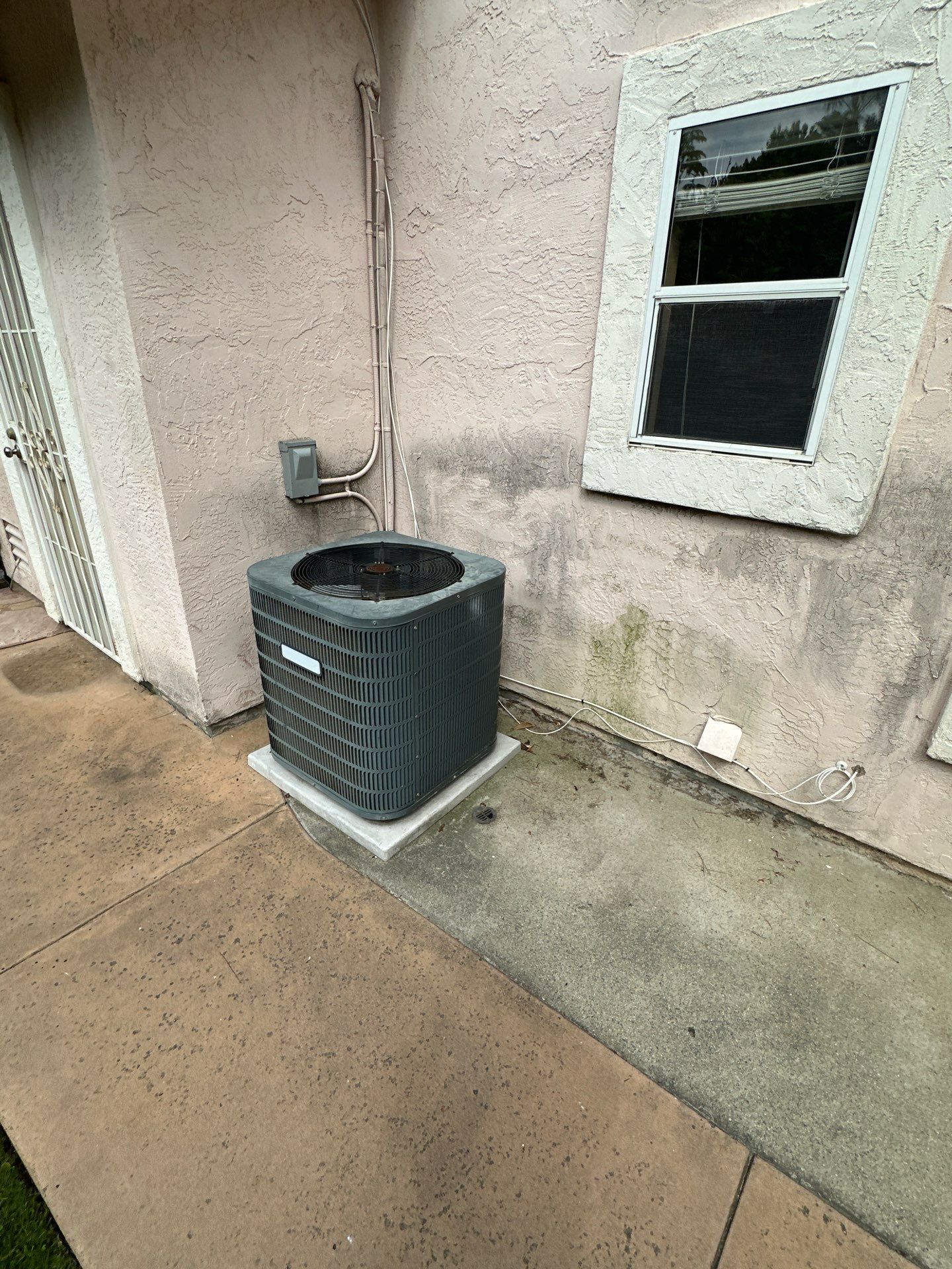 House Washing, Concrete Cleaning, and Window Washing with a Side of Gutters by Property Cleaning Experts