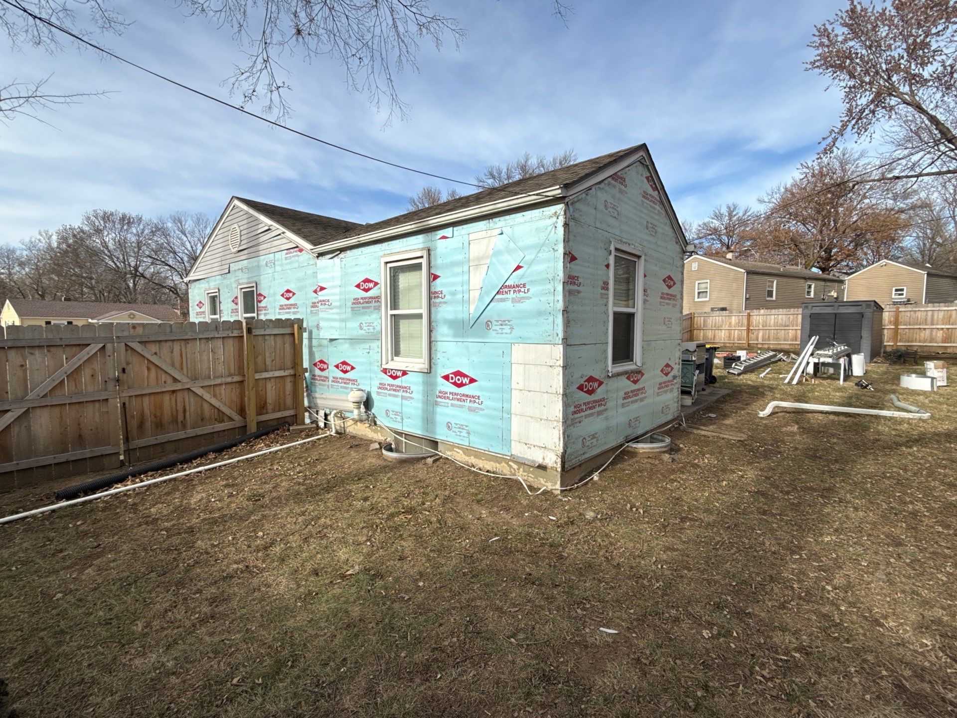 A whole new look for this Gladstone Home  by EEC  Windows, Siding & Roofing 