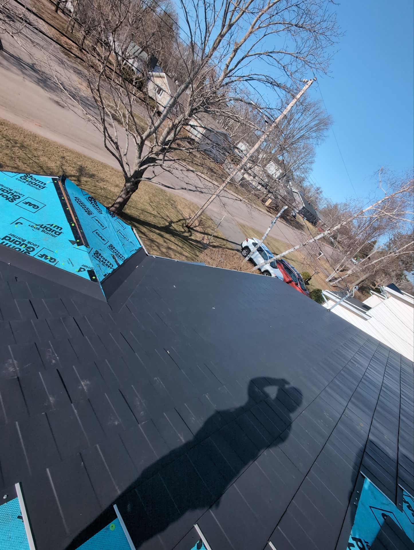 Residential Roofing Installation using Wakefield Bridge Steel Shingle by Ideal Steel by Artisan Roofing & Home Improvements Inc.