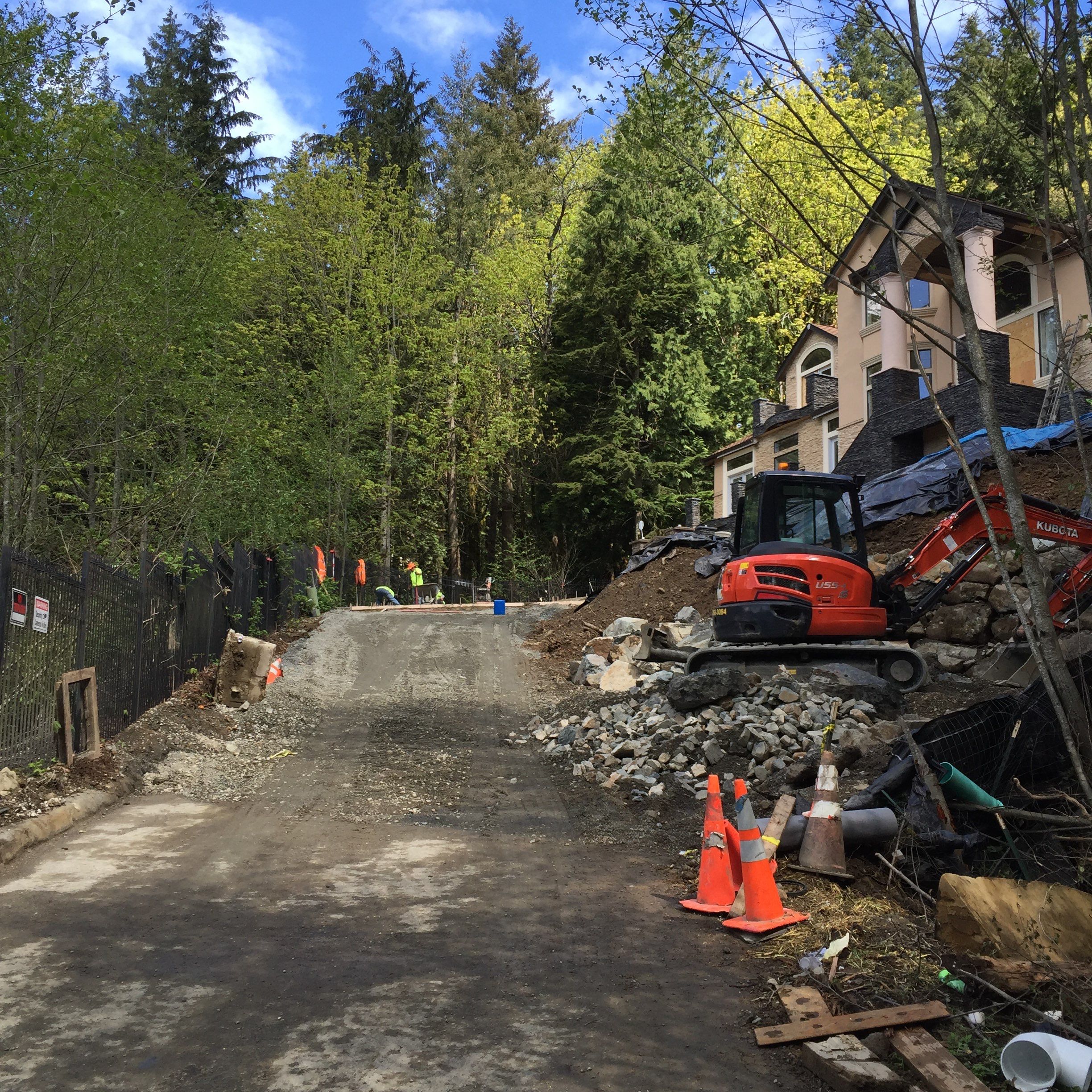Asphalt Driveway and Stamped Concrete Patio Finish  by Jireh Asphalt & Concrete Inc 