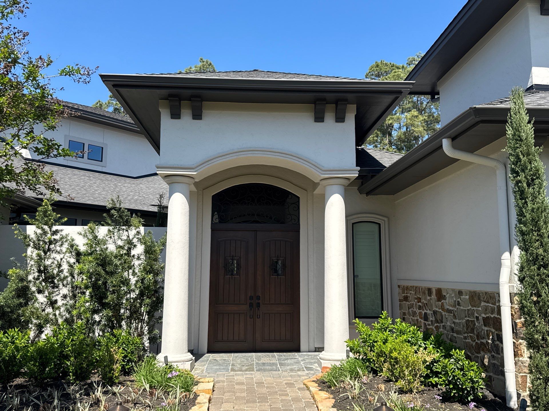 Complete Exterior Painting and Stucco Refinishing in Spring by Rolling Nations