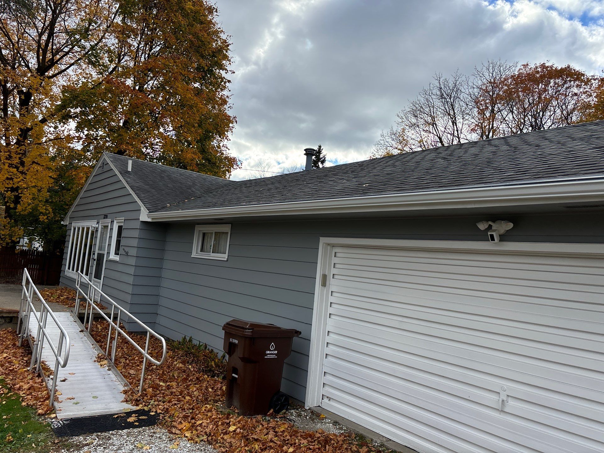 Gutter Installation using Seamless Gutters- Aluminum with Gutter Protection by Acme Exteriors