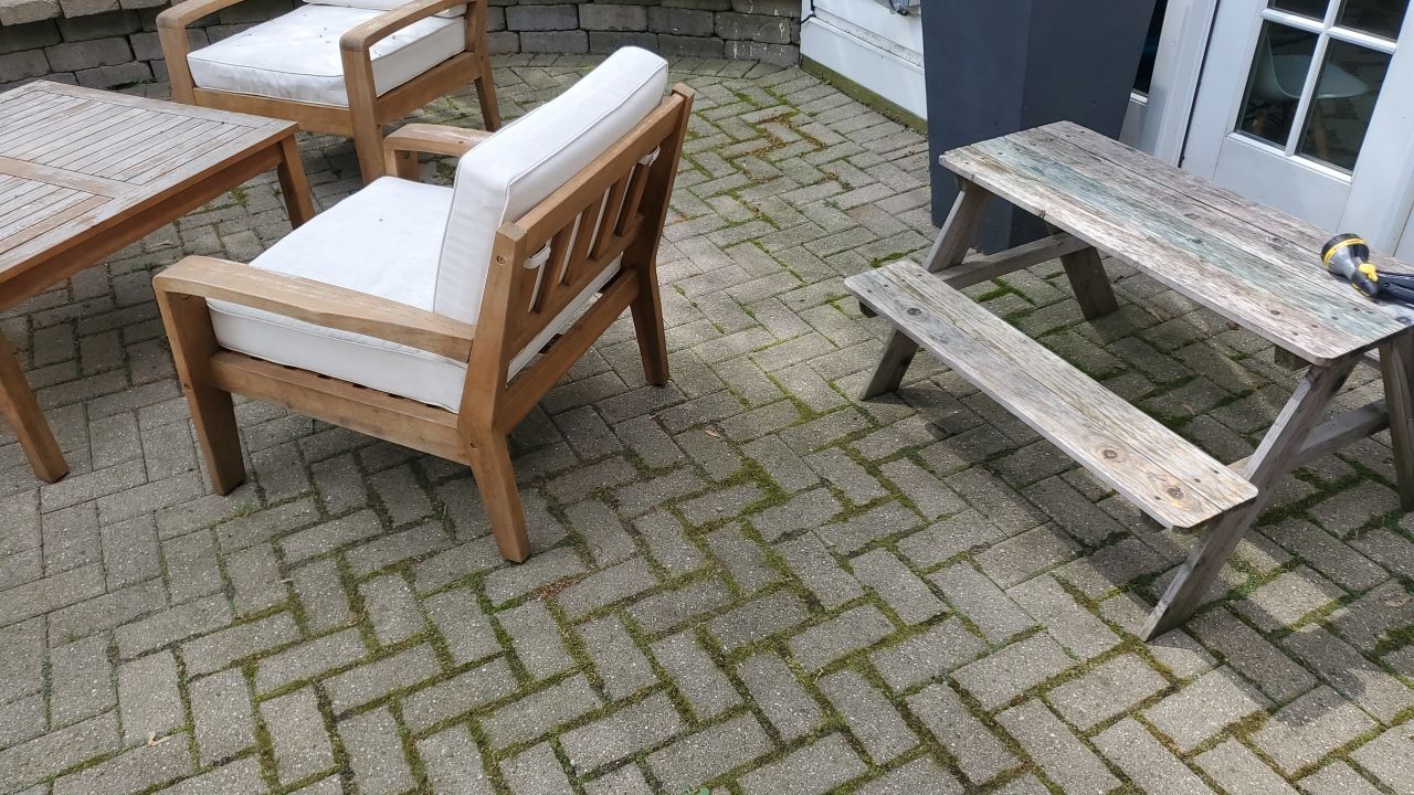 Brick patio repair, clean sand and seal by Northern Power Washing LLC.